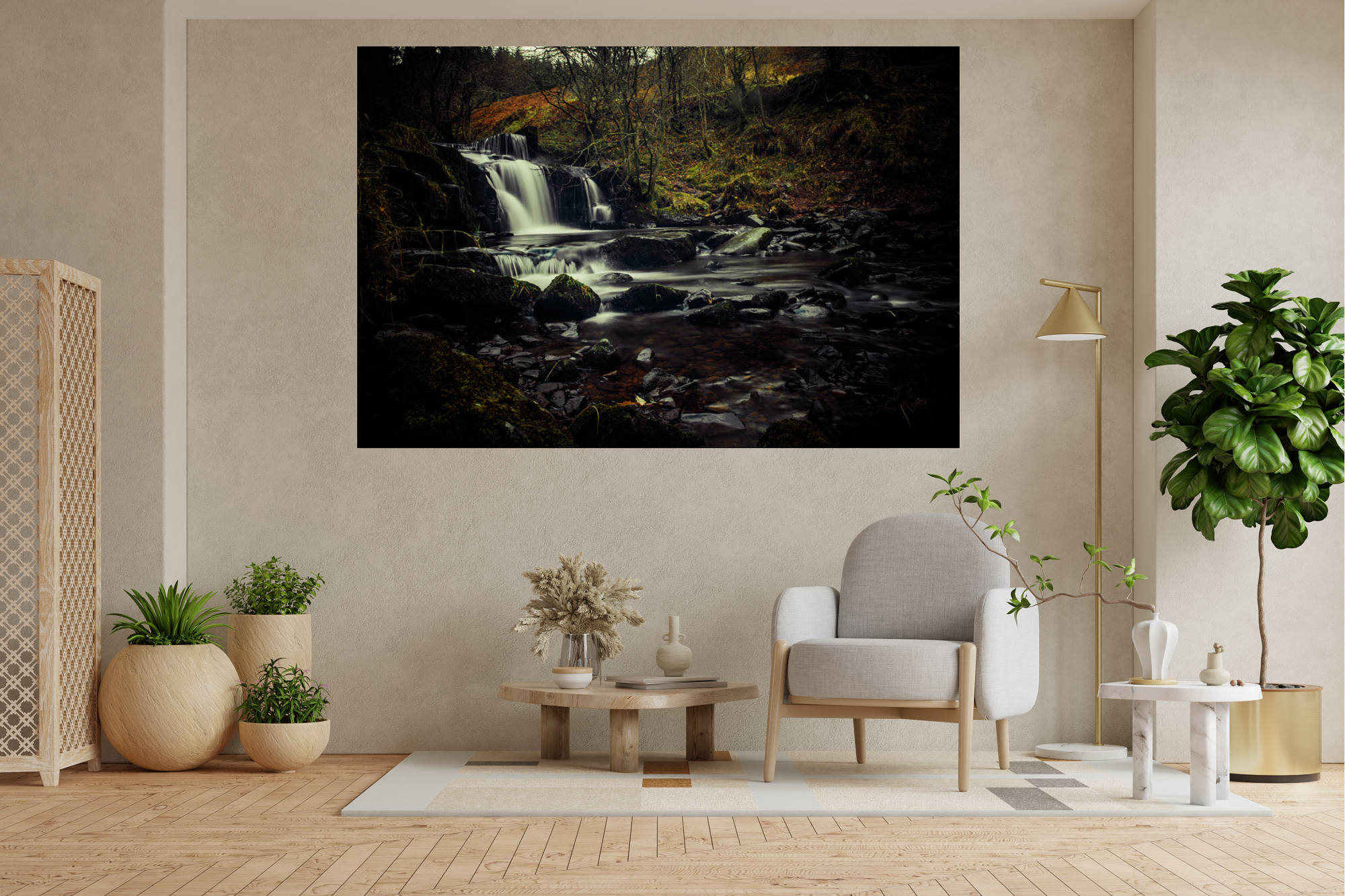 Living room with plants, a chair, a side table, and artwork of a waterfall on the wall.