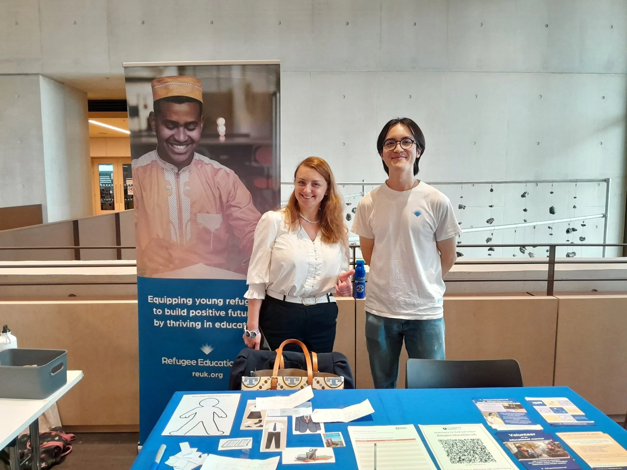 Nataliia and Cennydd making friends at the volunteer fairs