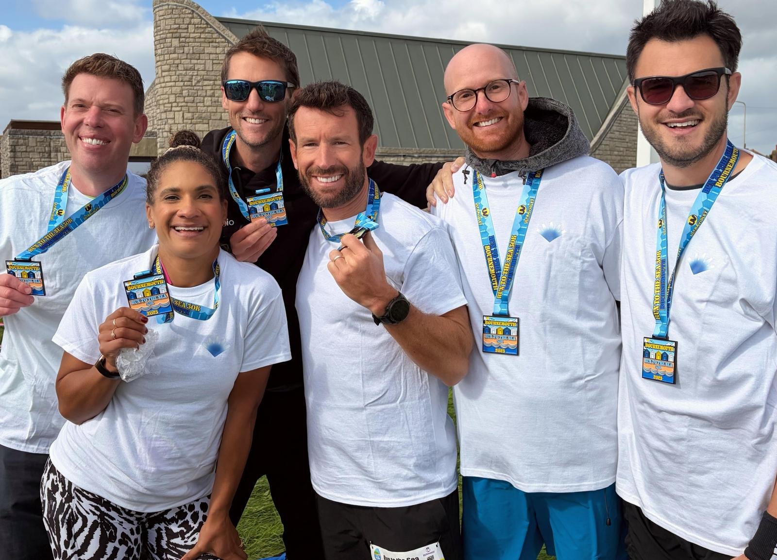 Our ultra-marathon heroes enjoying their well deserved medals
