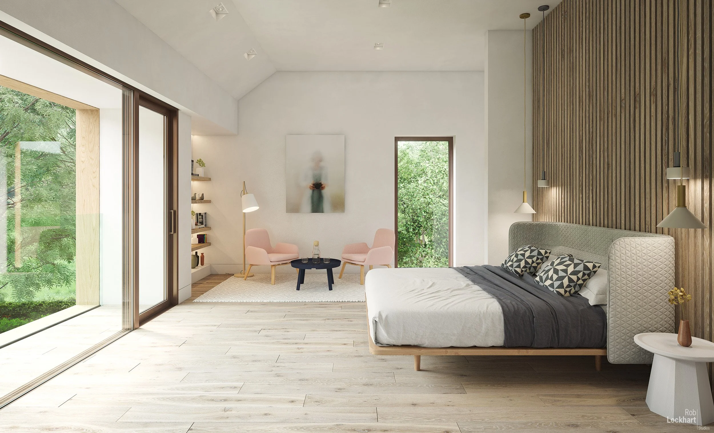 Modern bedroom with wooden floor, large bed with patterned pillows, wooden accent wall, small round side table with a vase, sitting area with two pink chairs, black coffee table, and large windows showing greenery outside.
