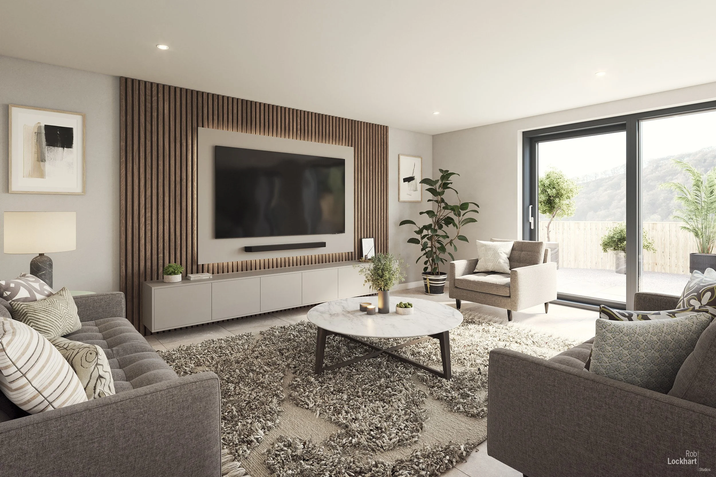 Modern living room with gray sofas, a white marble coffee table, a rug, potted plants, wall art, a large wall-mounted TV, and sliding glass doors opening to an outdoor patio with trees.