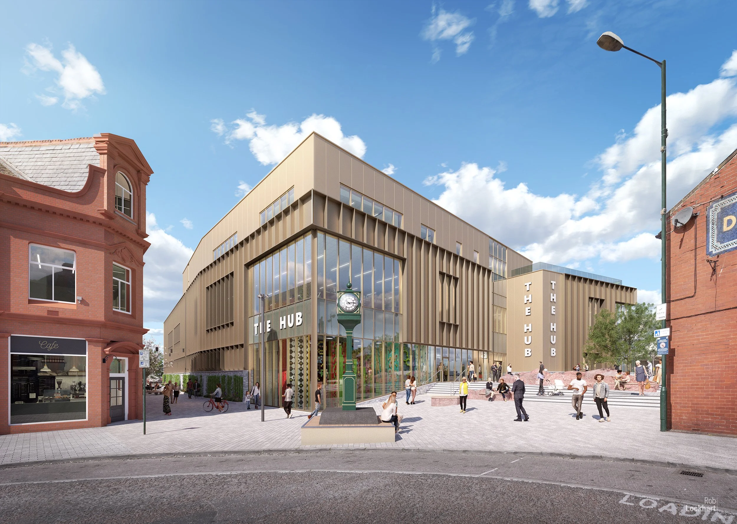 A modern architectural building labeled 'The Hub' with large glass windows, located in an urban setting surrounded by older brick buildings, with a pedestrian plaza in front, people walking and socializing, and a vintage-style green clock in front of