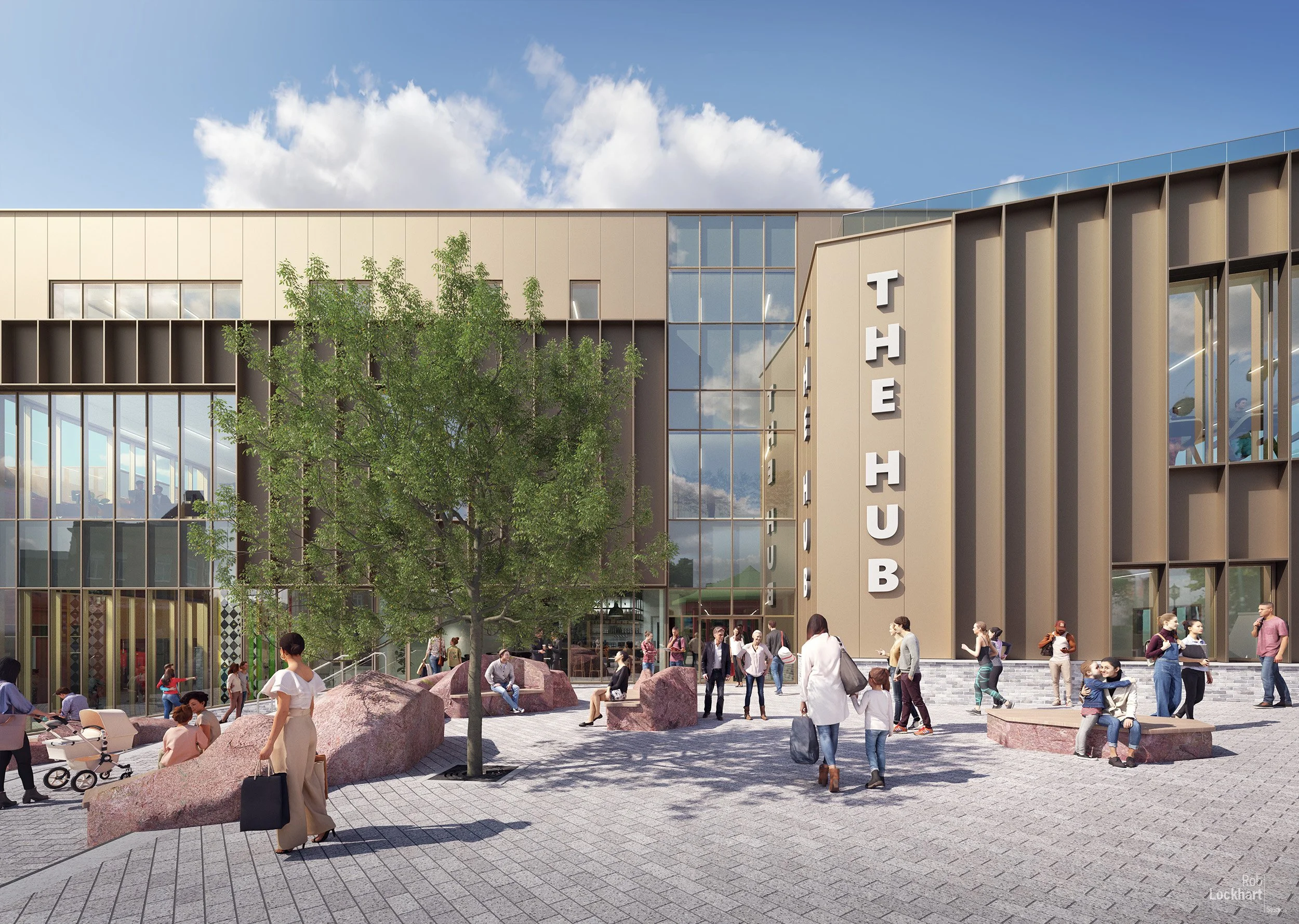 Exterior view of a modern building labeled "The Hub" with people walking, sitting, and socializing in an outdoor plaza featuring large rocks, a tree, and benches on a sunny day.