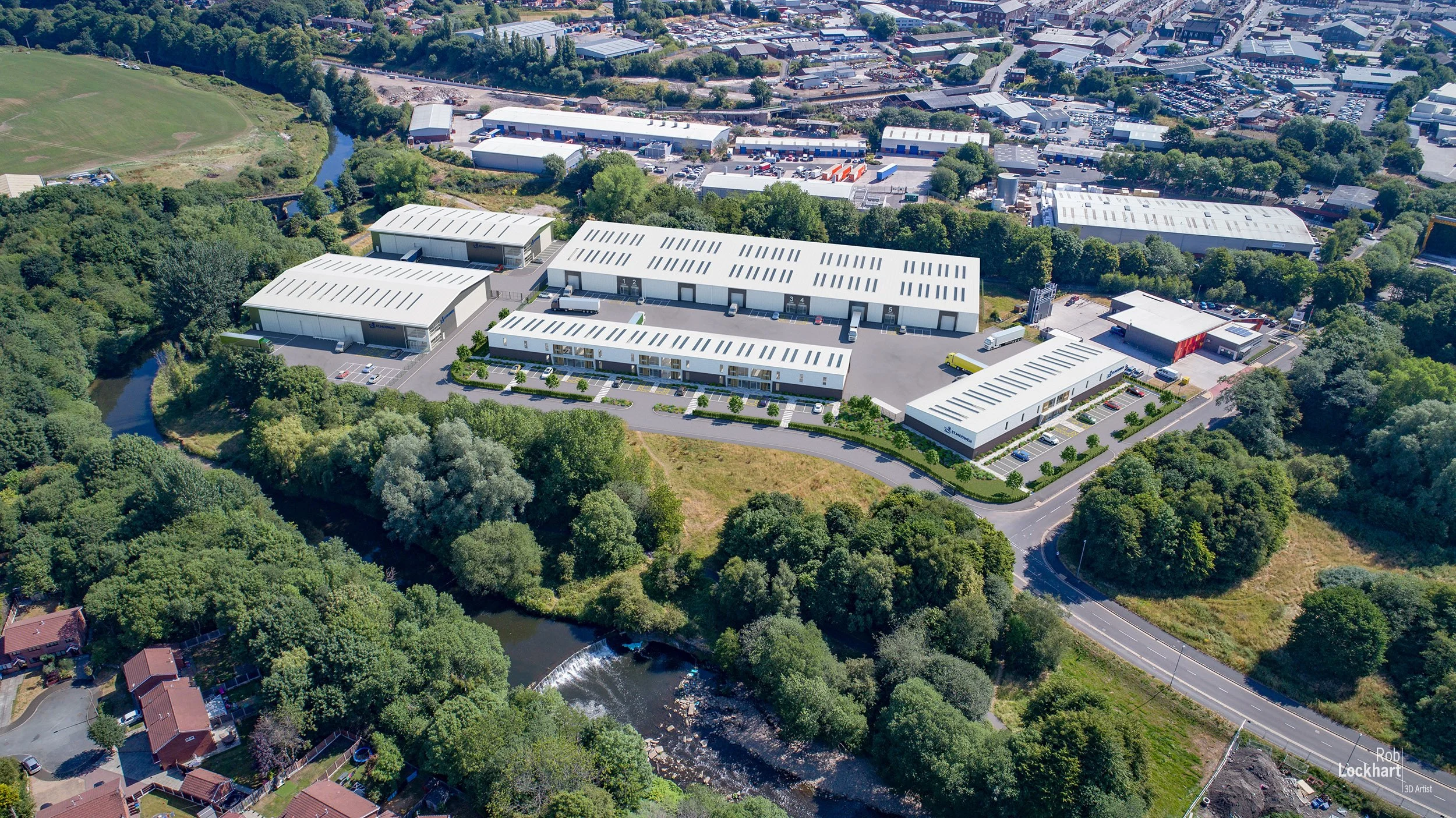 Aerial view of a commercial industrial complex surrounded by green trees and small residential houses, with a small river flowing nearby.