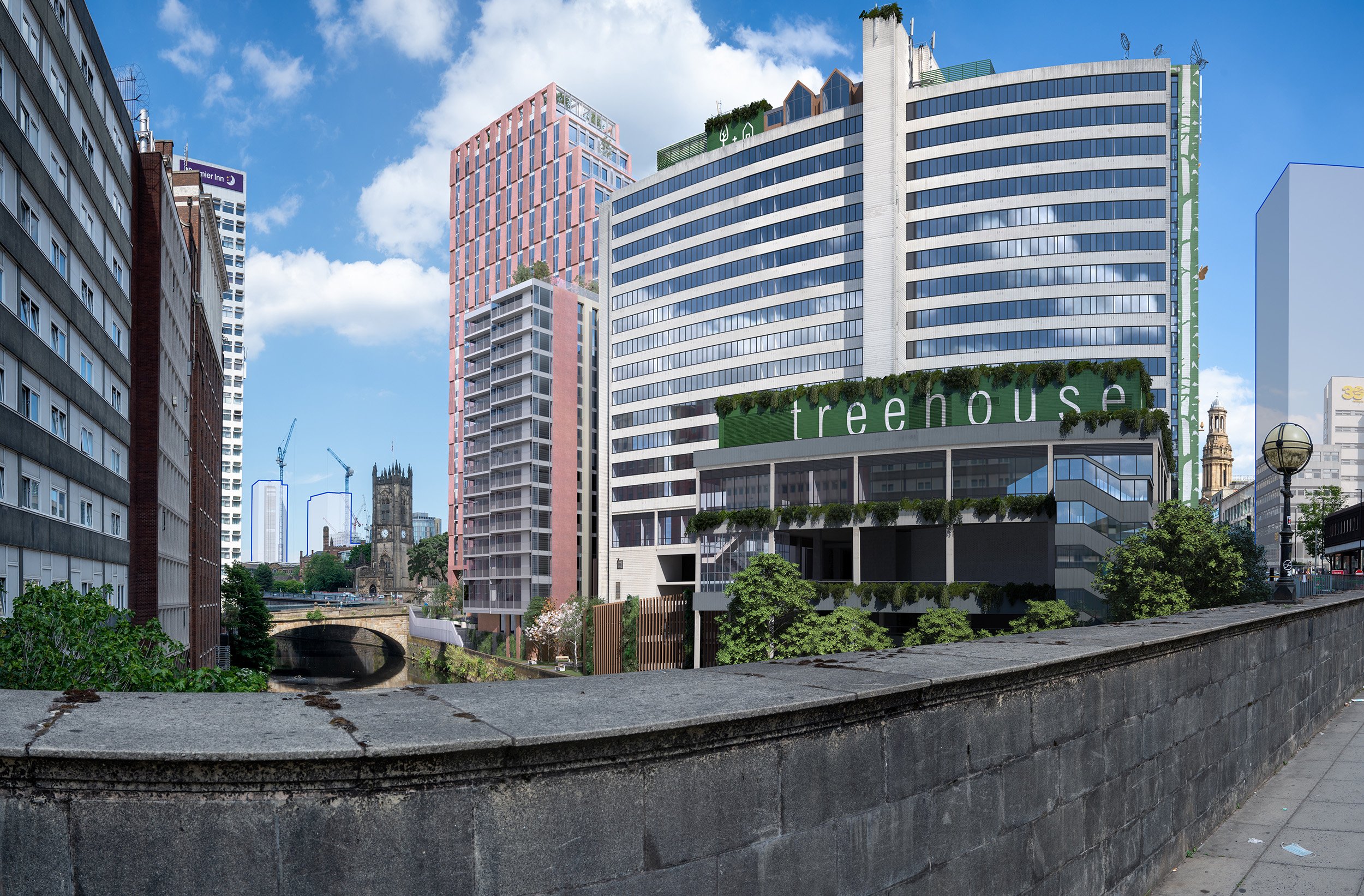 Modern cityscape with tall buildings, a bridge over a small river, and a clear blue sky.
