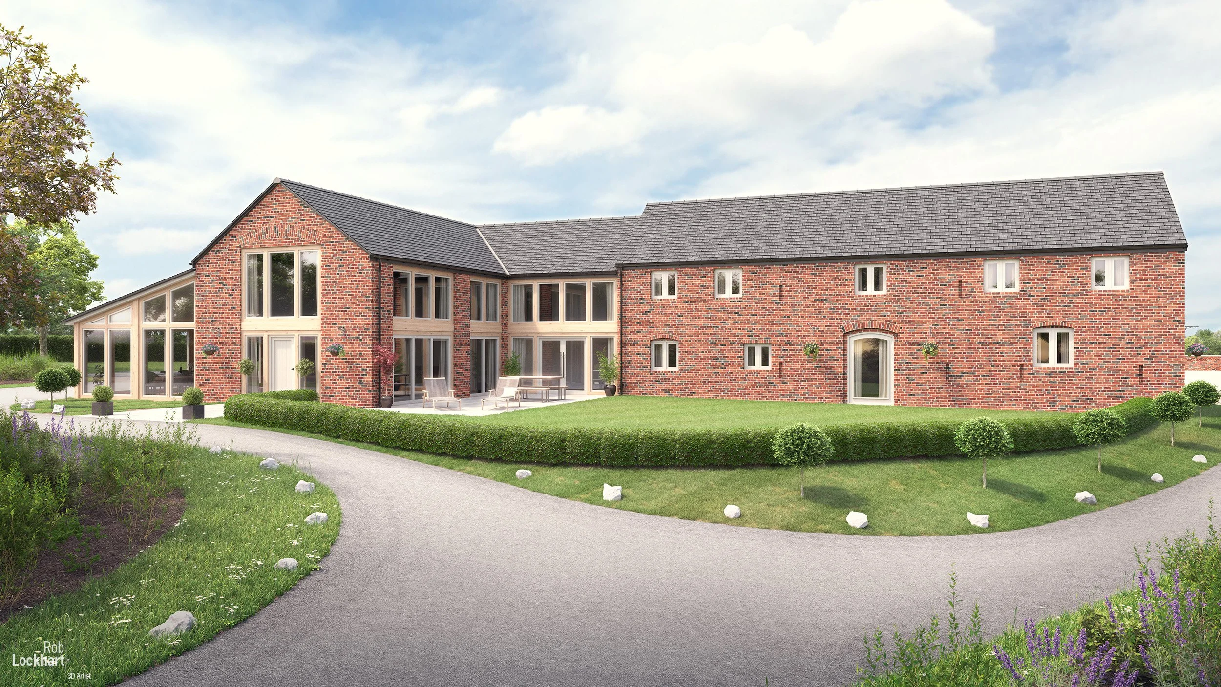 A two-story brick house with large windows and a sloped roof, surrounded by green lawn, shrubs, and a curved driveway.