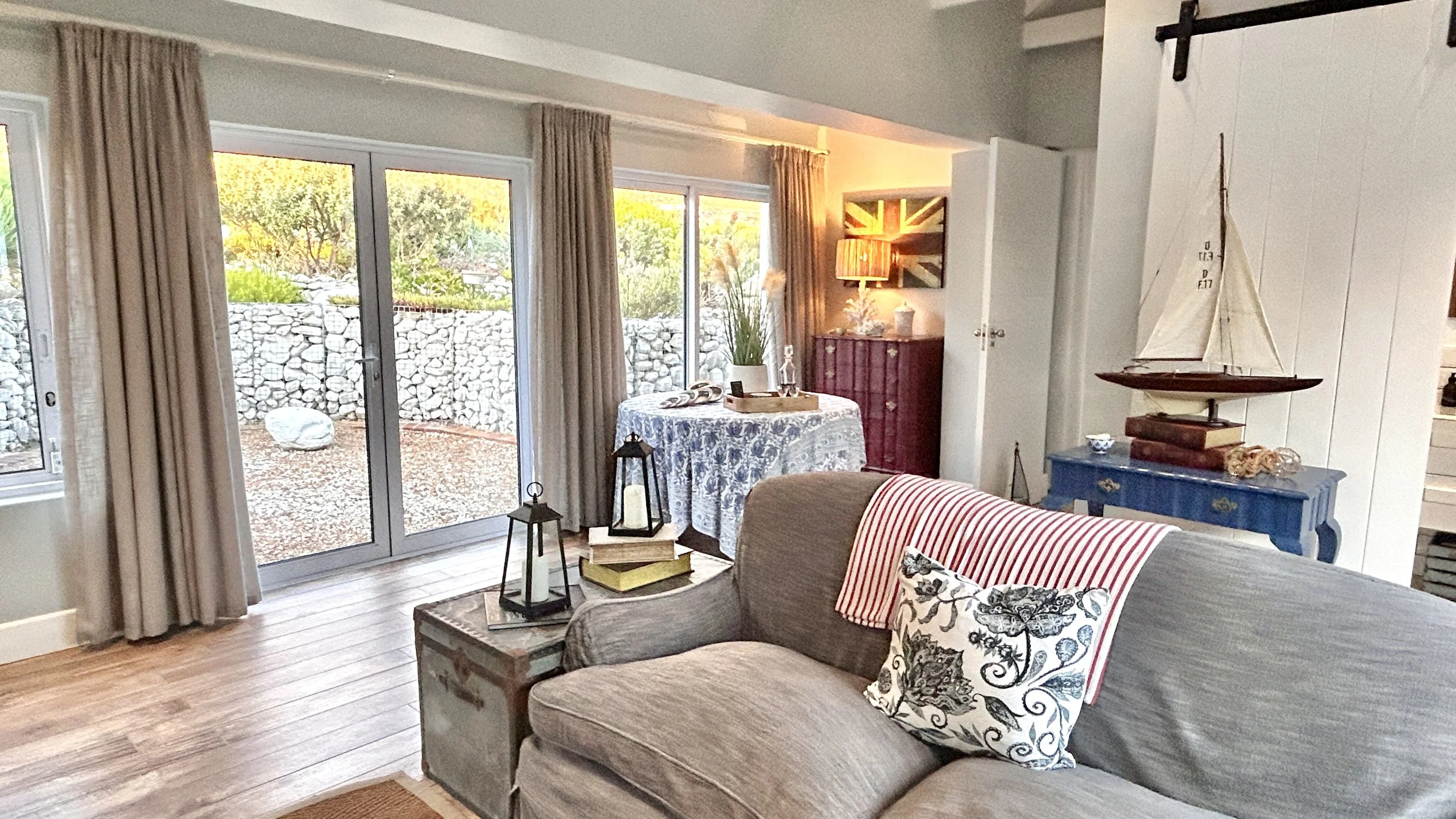 Large lounge area with a second bathroom and shower. Light, bright and airy - Misty Shores Cottage