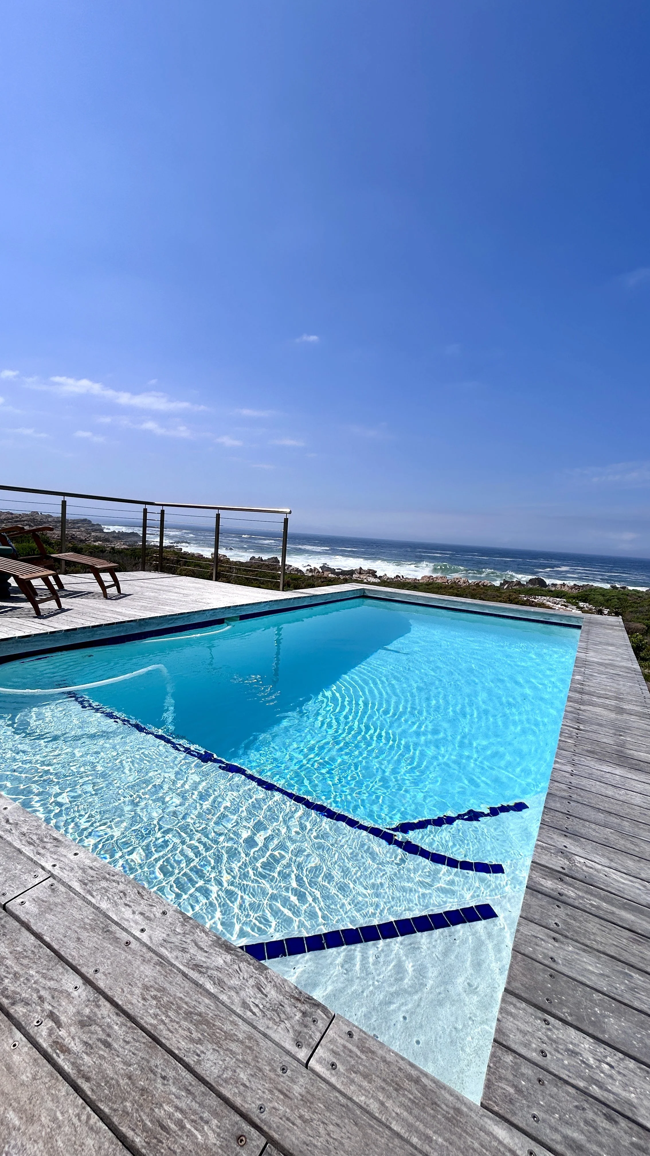 Oceanfront fresh water pool at Misty shares cottage - the pool is on the deck of Kalliste Beach house and is shared between the two properties. 