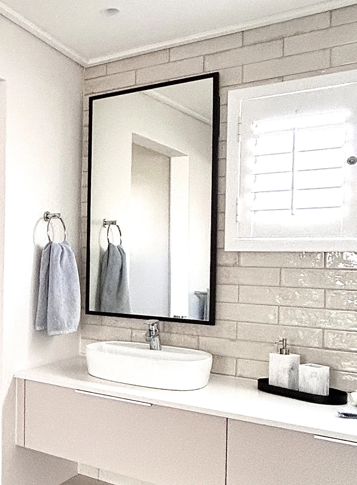 Main en-suite with walk in rain shower and dressing room at Whale Walk Apartment