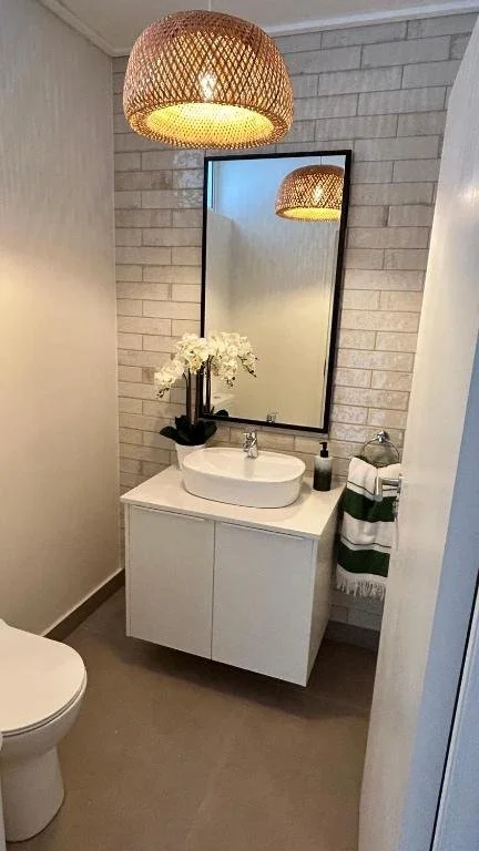 Guest bathroom on the lower level of Whale Walk Apartment
