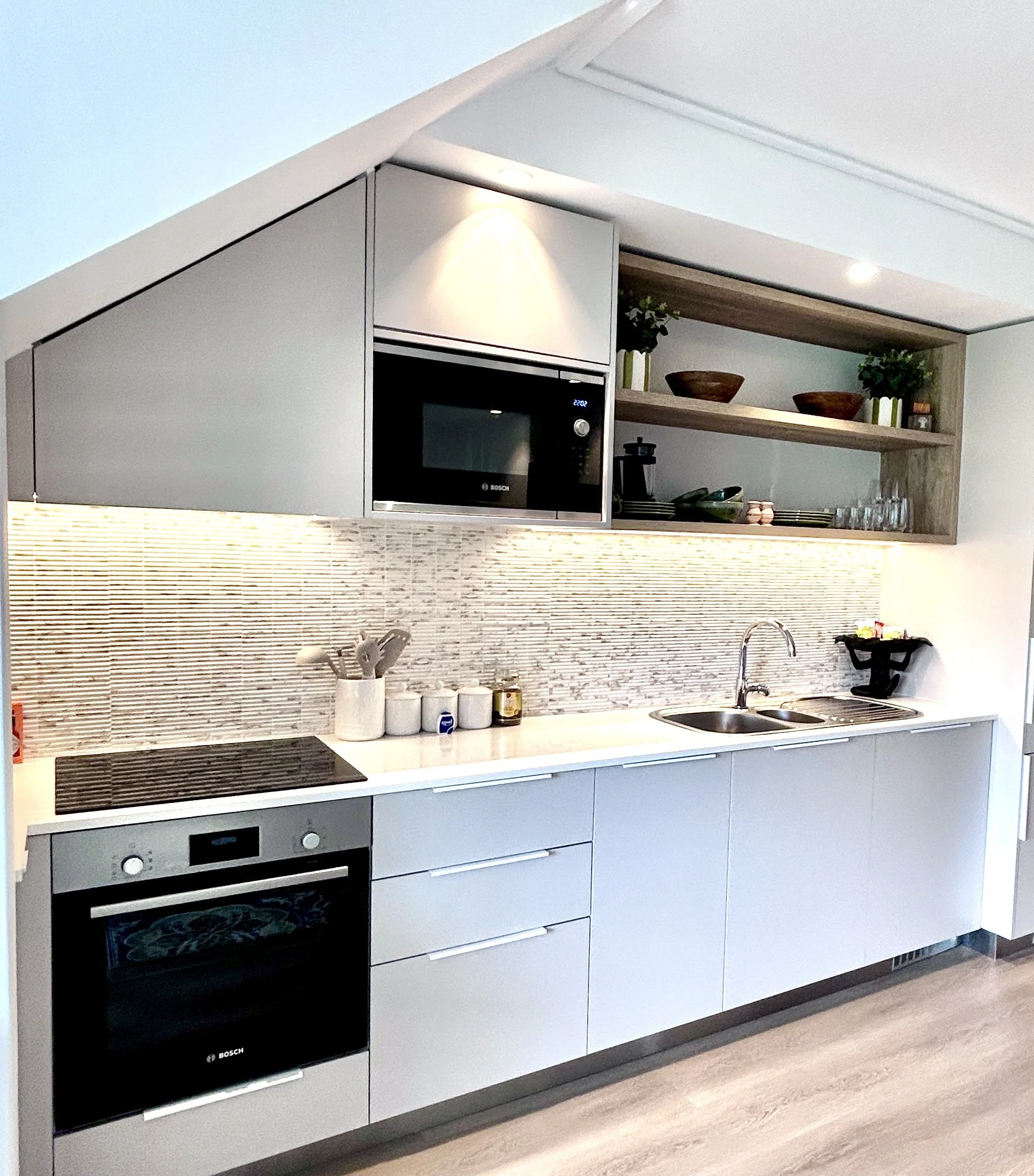 Modern, fully equipped kitchen with coffee station. Premium built in appliances throughout.