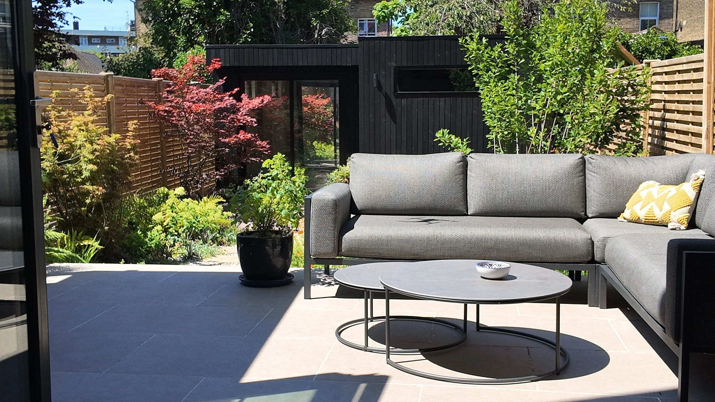 Brockley Garden Design Outdoor Seating Area with Garden Room