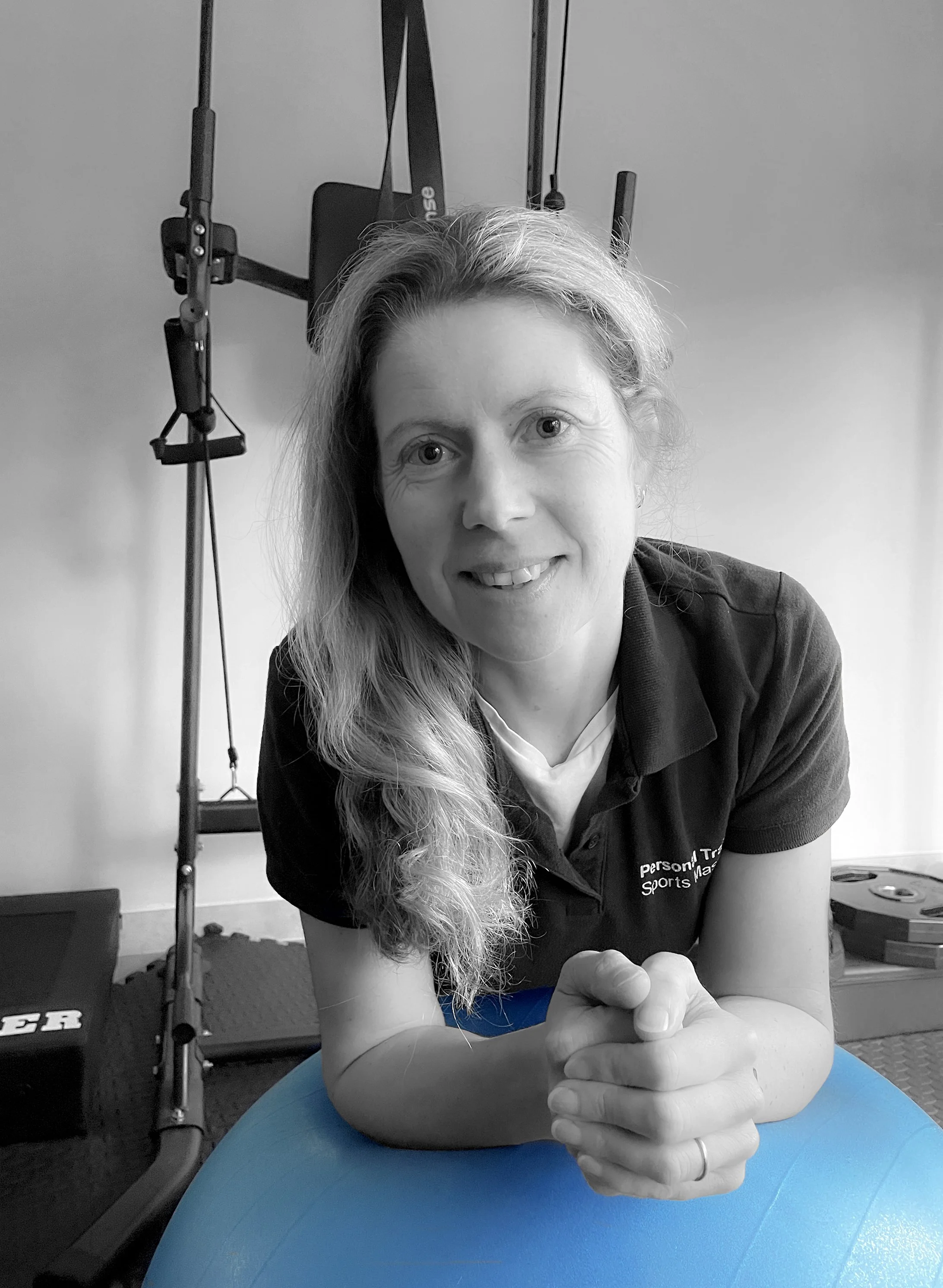 Lucy Mackintosh in her bodyformat fitness studio  leaning on a Swedish ball