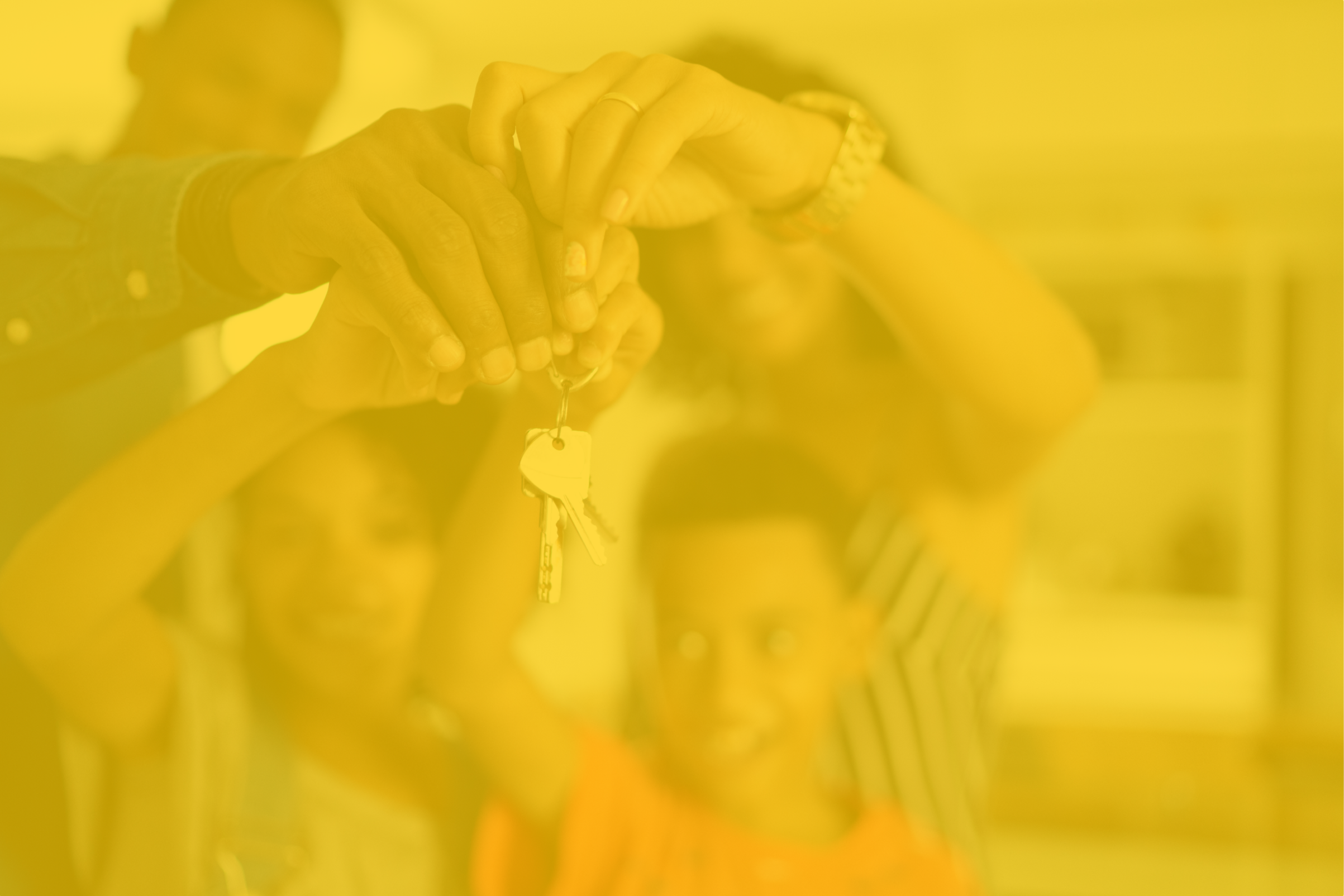 A family holding hands and showing off a key with a keychain in front of their new house. Colorized image with a yellow wash.