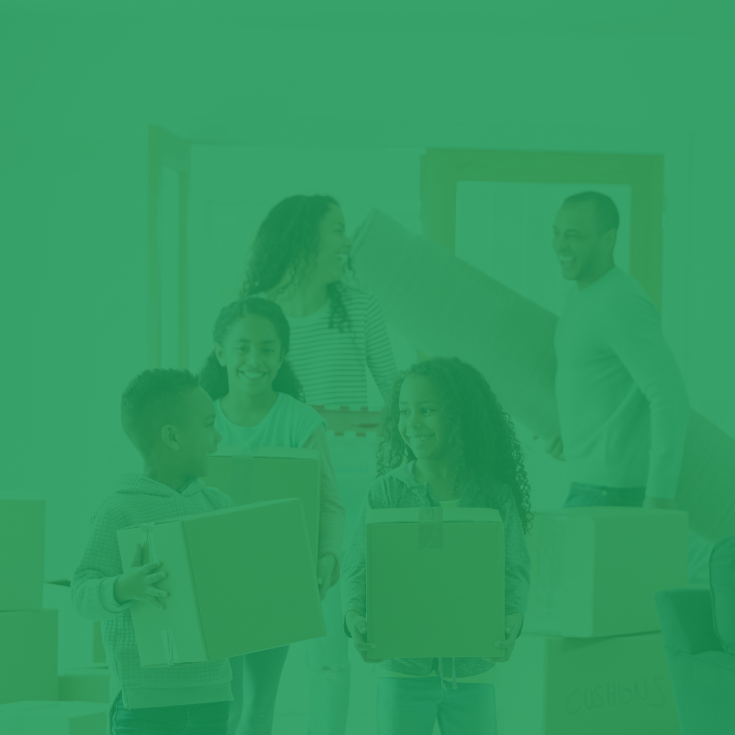 People smiling and holding cardboard boxes in a room.