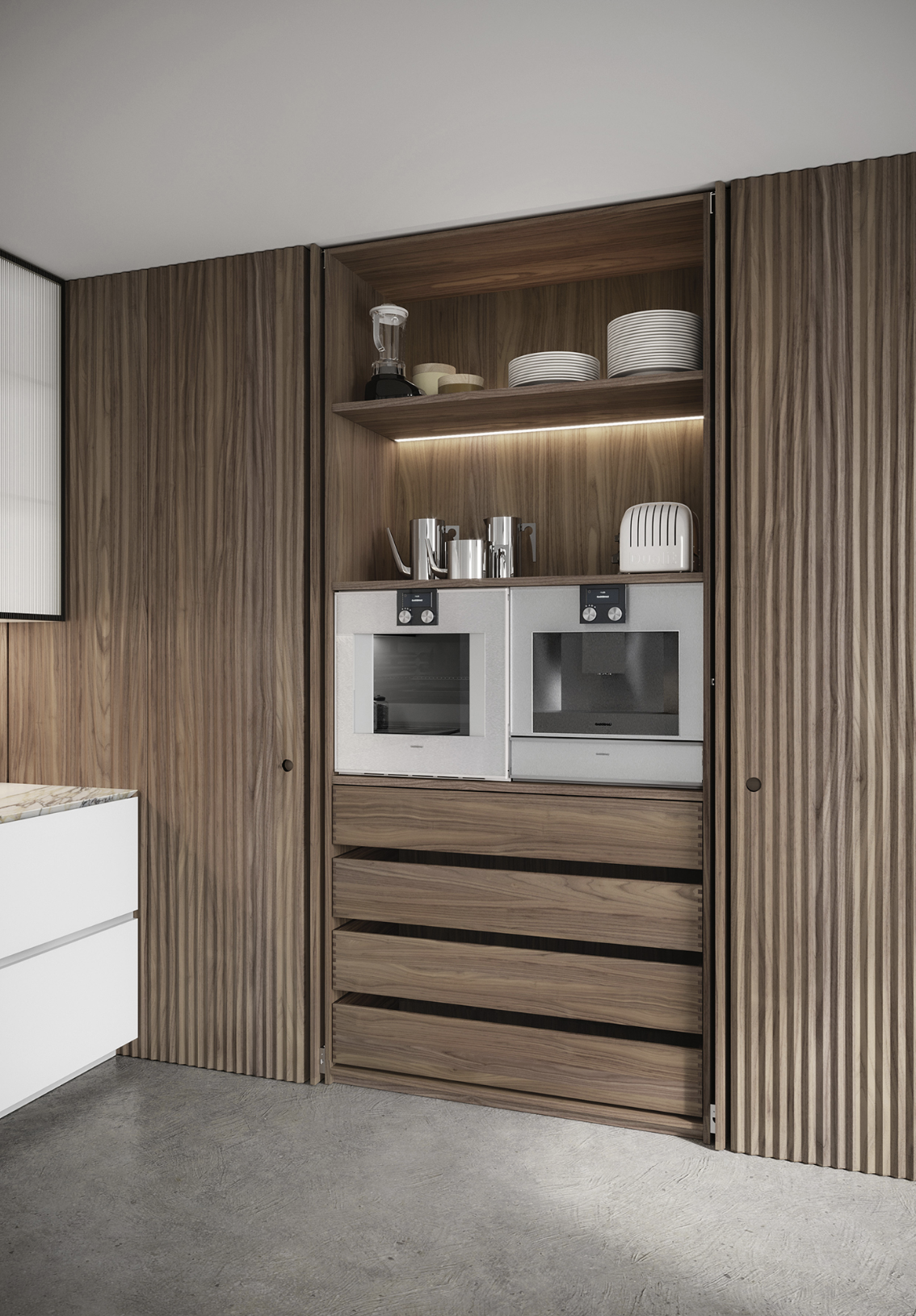 Modern kitchen with wood paneling, built-in ovens, open shelving with dishes, and small appliances.