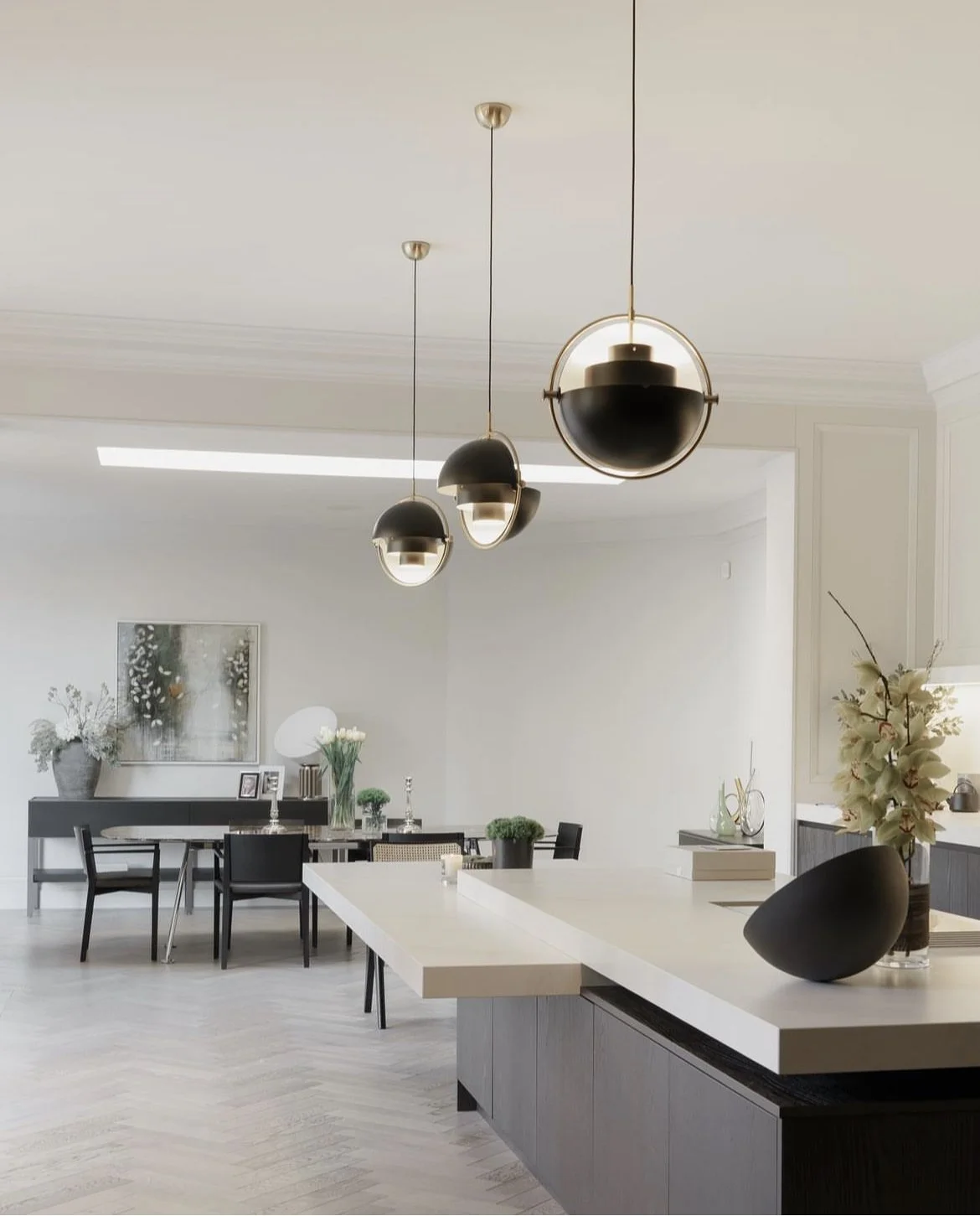 Modern kitchen with Calacatta counter tops and dark stained timber doors designed by Melides Design with a John Pawson bowl