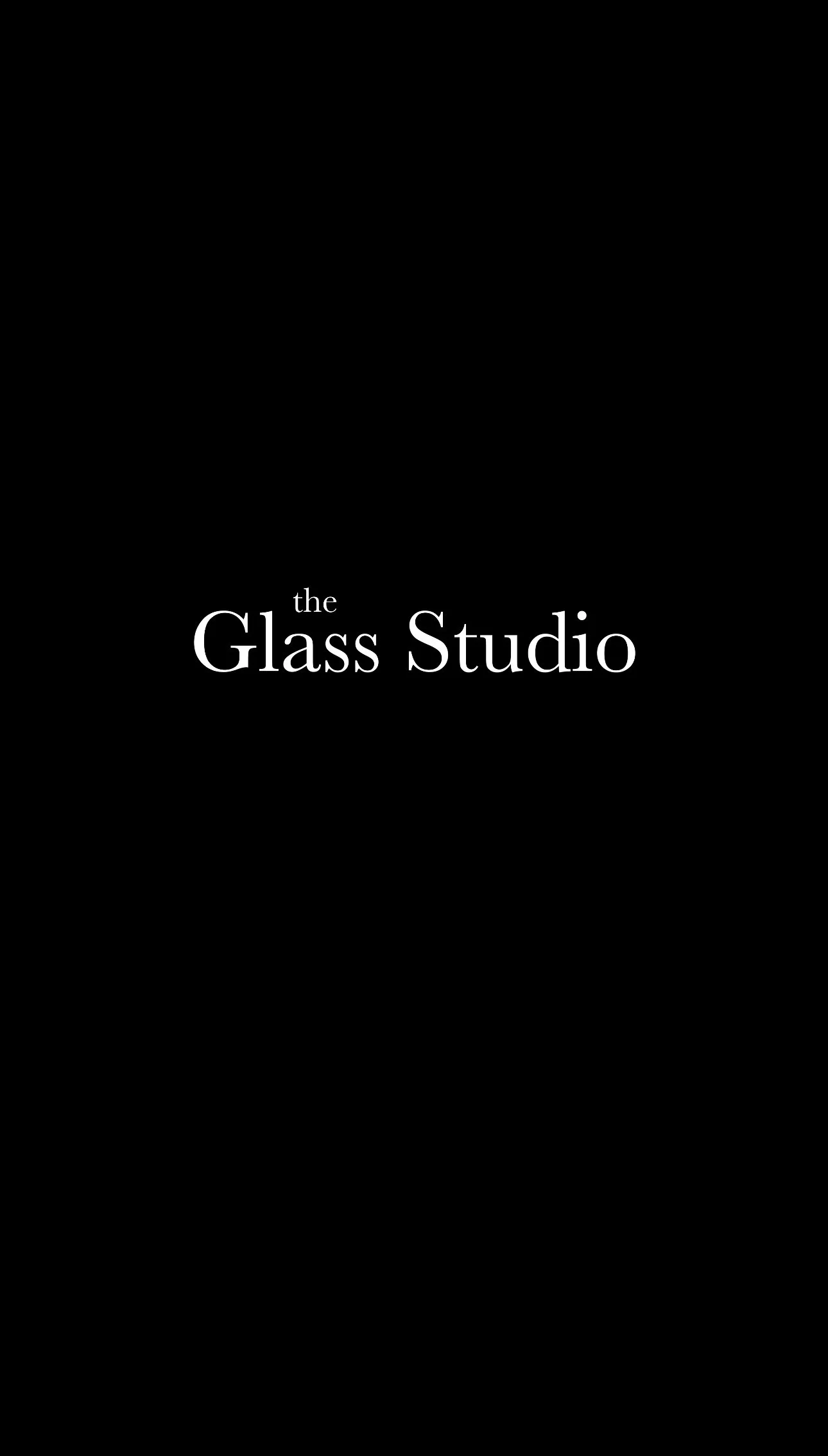 Logo for The Glass Studio with the tagline "glass for living" in black text.
