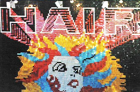 Display eine Frau mit dem Titel HAIR