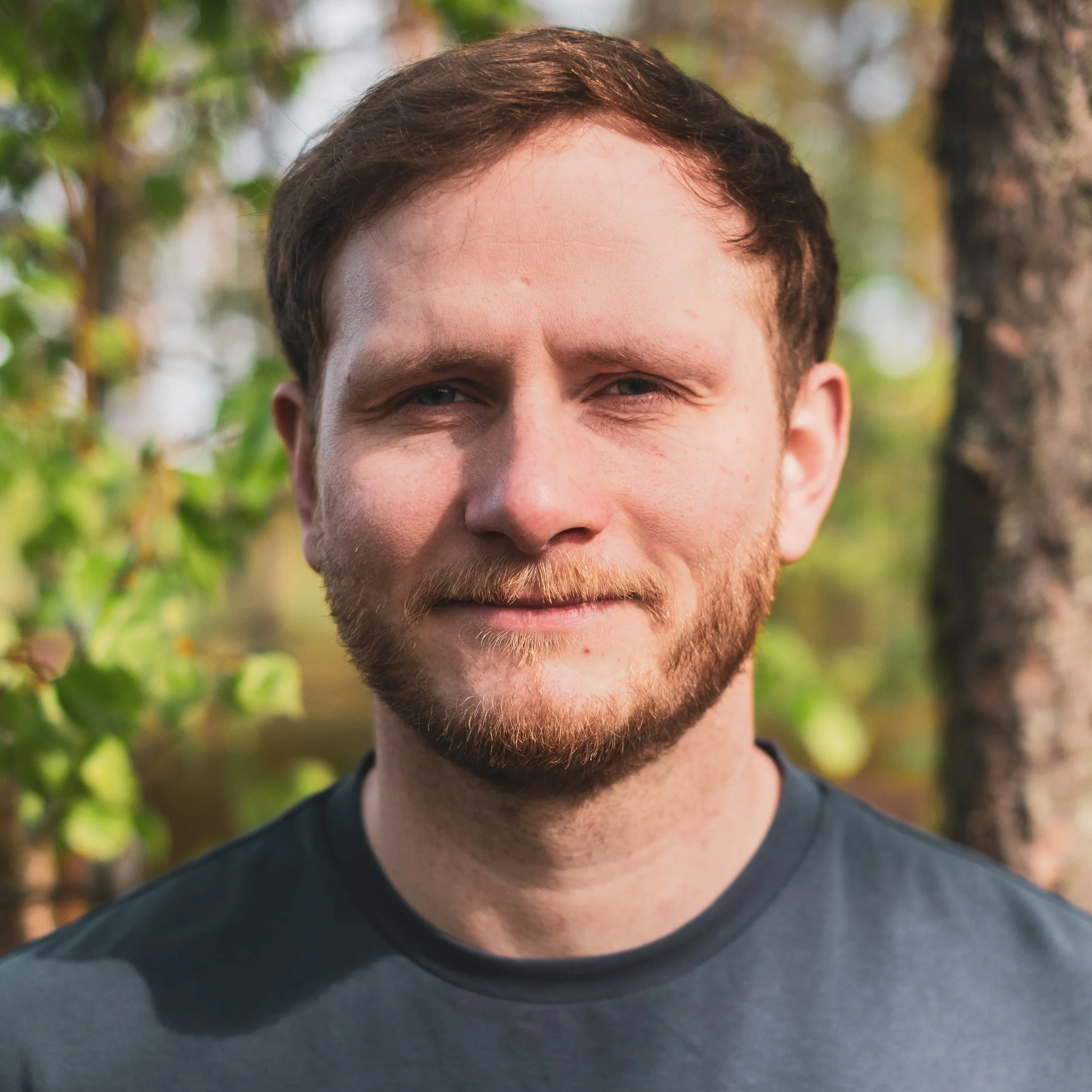 Kristofer Law, personal trainer in Glasgow, standing outdoors.
