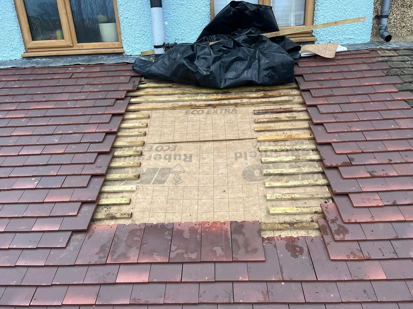 Existing roof prior to roofing repairs and refurbishment.