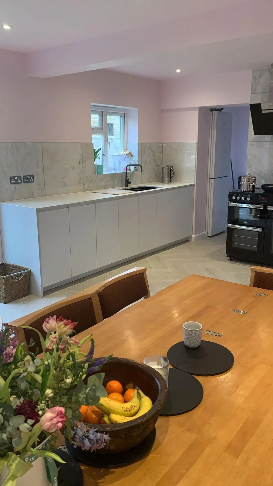 Custom modern kitchen fitted to client specifications, featuring high-quality finishes and practical design.