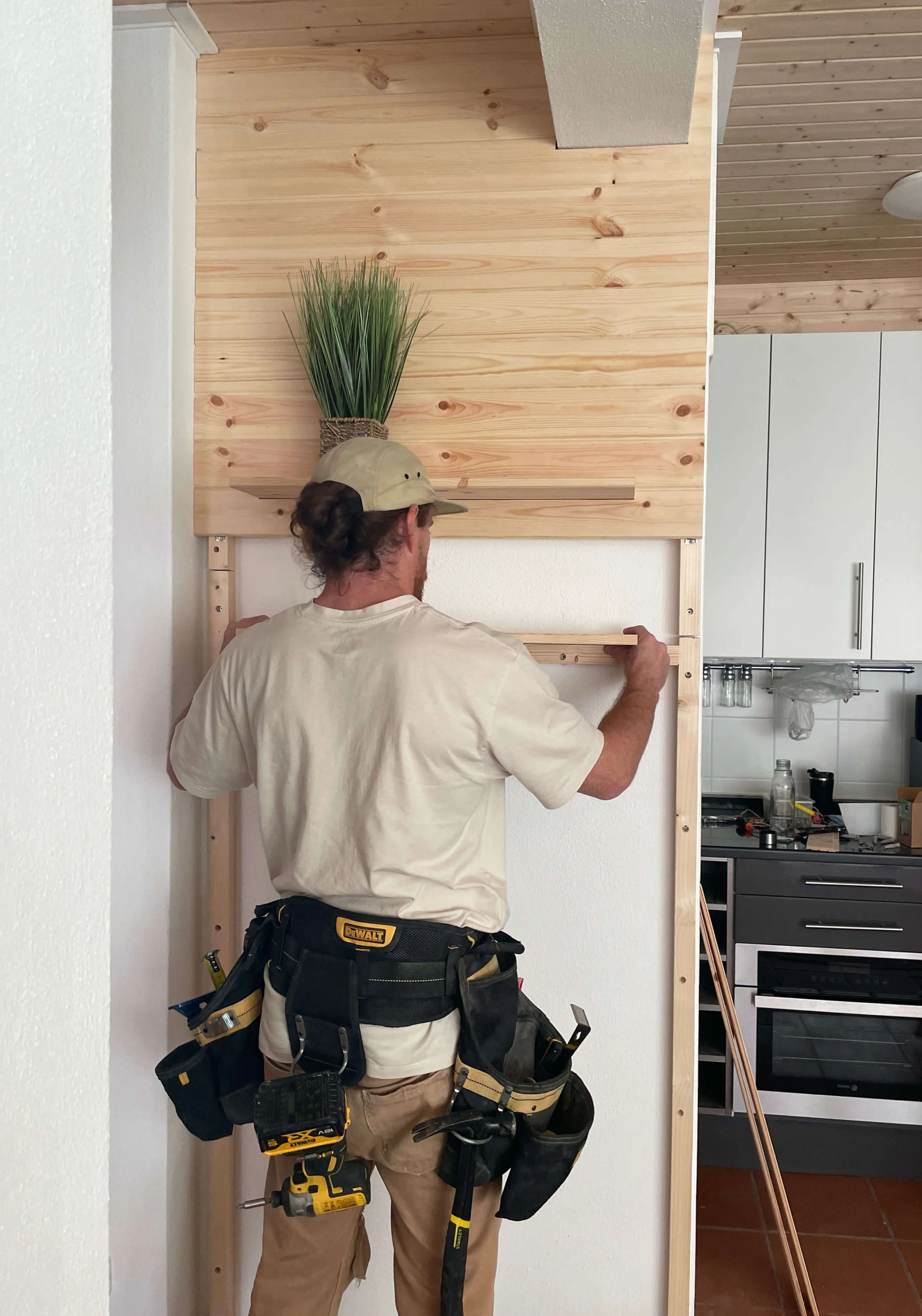 Alex Savoie doing carpentry work