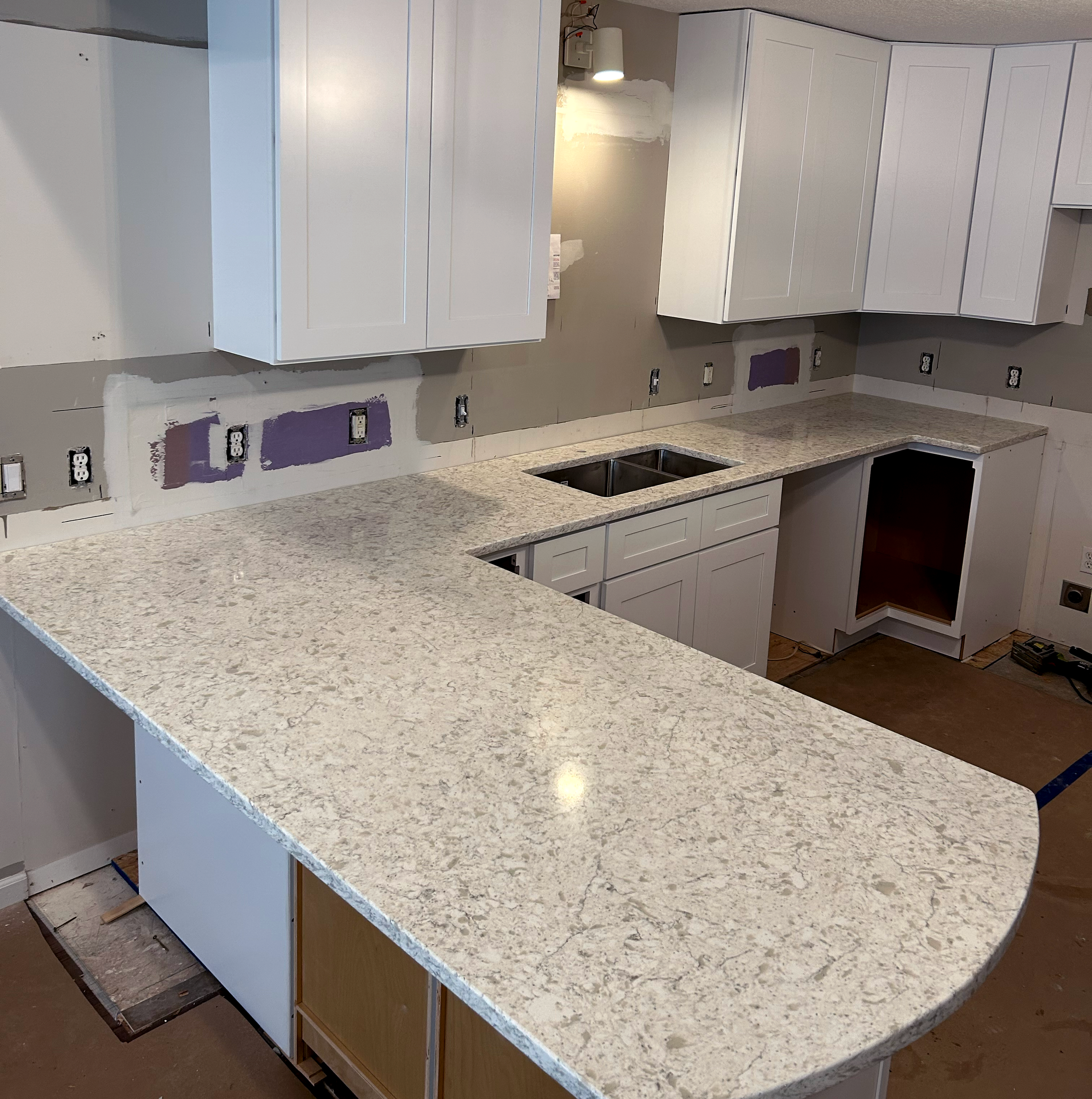 Stonecrafters granite countertop and double sink installation in a new kitchen build
