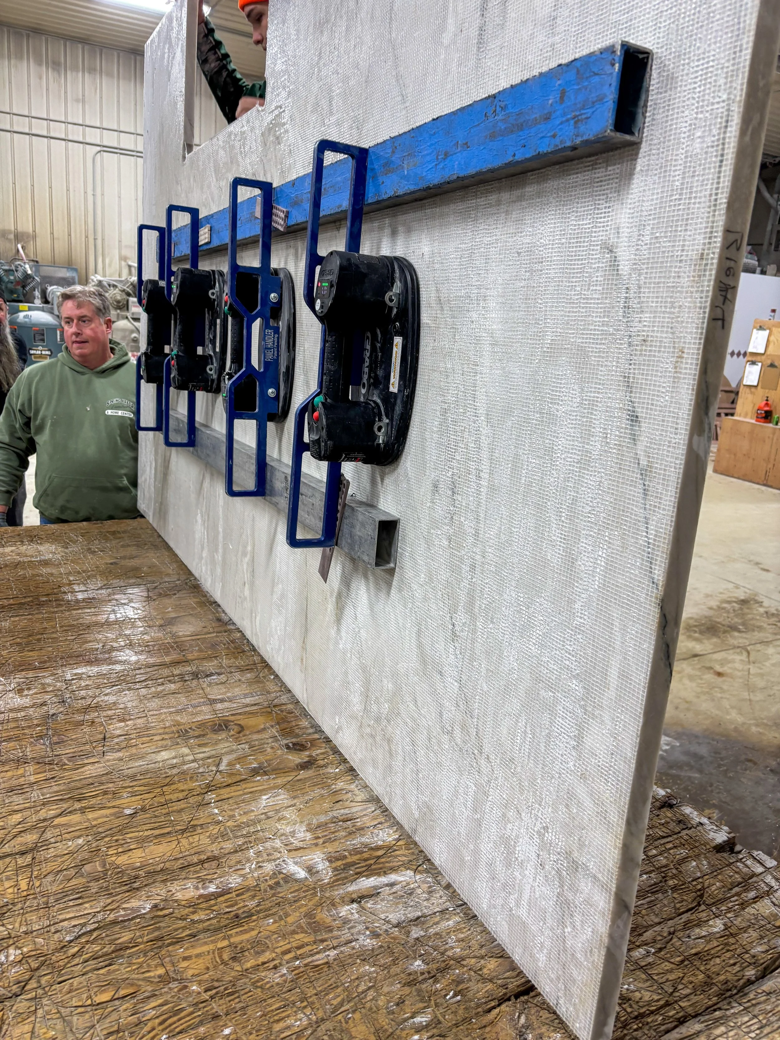 Stonecrafters fabrication workshop with professional stone cutting and finishing tools