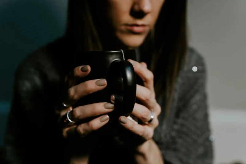 Woman holding a coffee mug