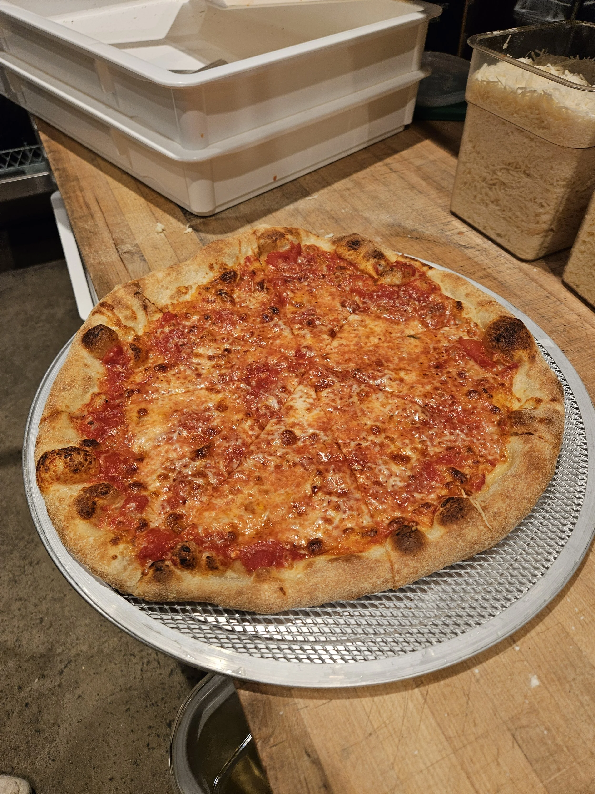 Honey Pie Pizza's classic Cheese pie, always made fresh and with the finest ingredients.