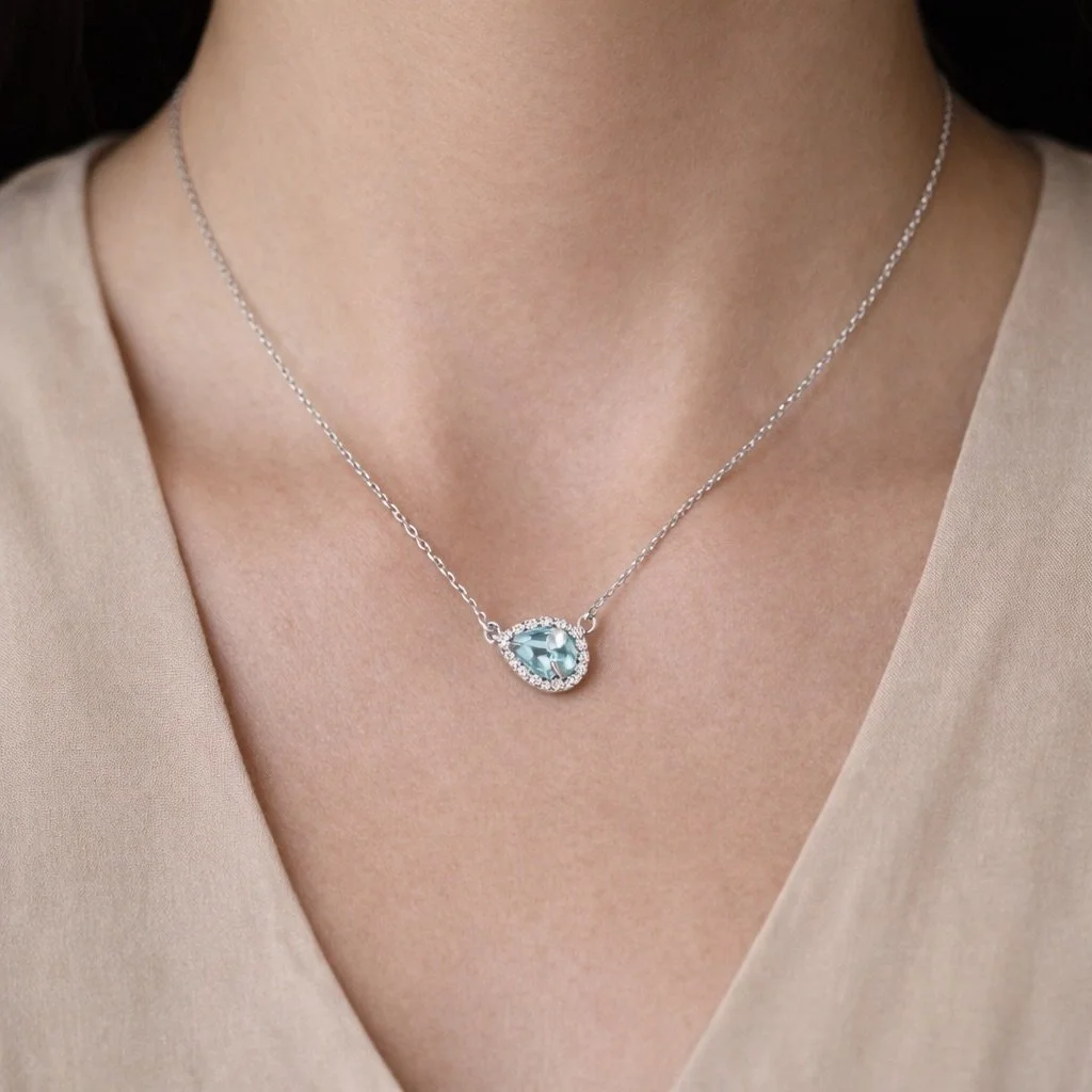 Aquamarine is the birthstone for March💎🩵
This necklace features a pear shaped natural aquamarine in a beautiful natural diamond halo. This piece is very versatile and can be worn everyday or for special occasions. 
#jewelry #birthstone #aquamarine 