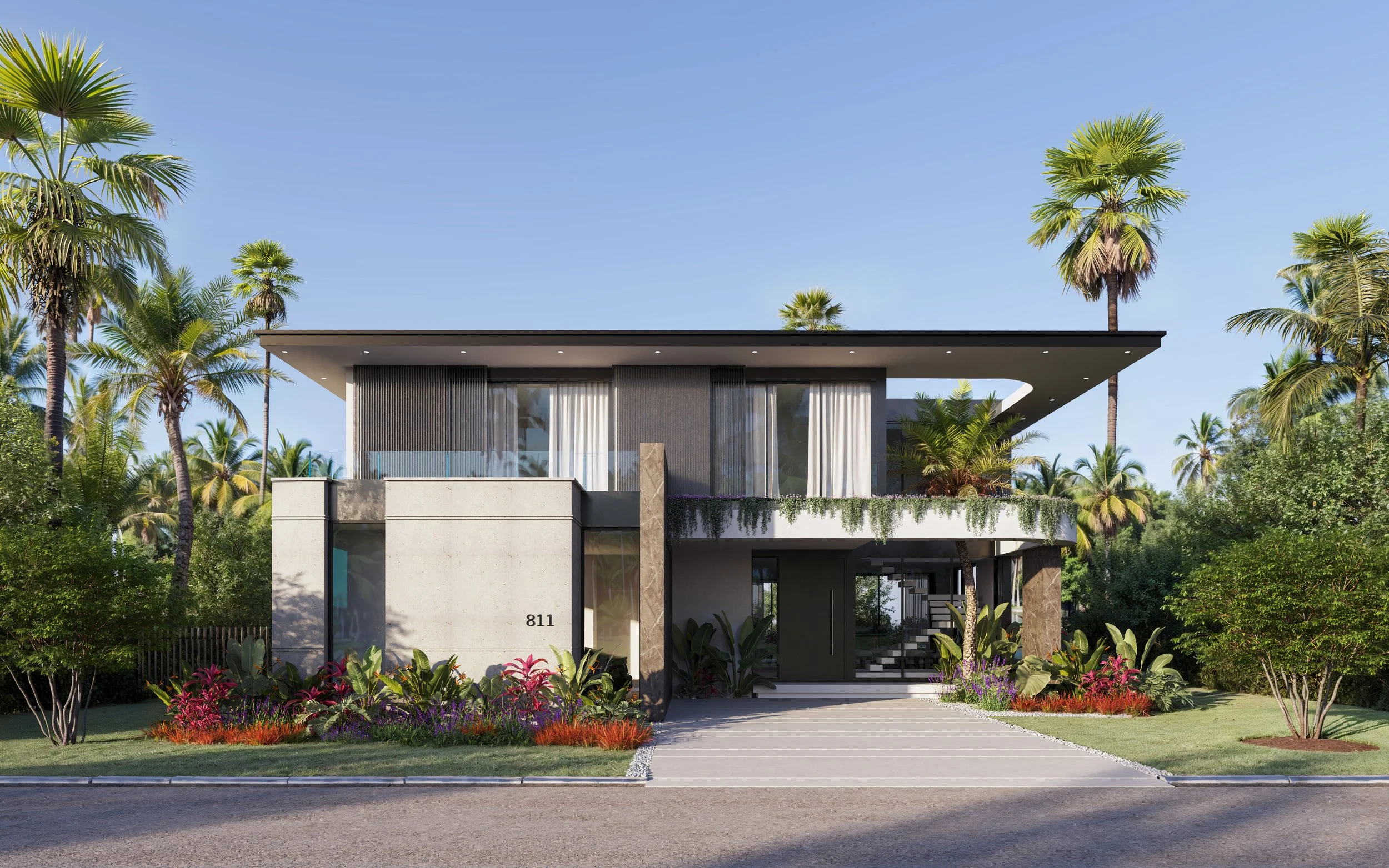 Modern two-story house with clean lines, large glass windows, and a flat roof, surrounded by lush tropical landscaping and palm trees.