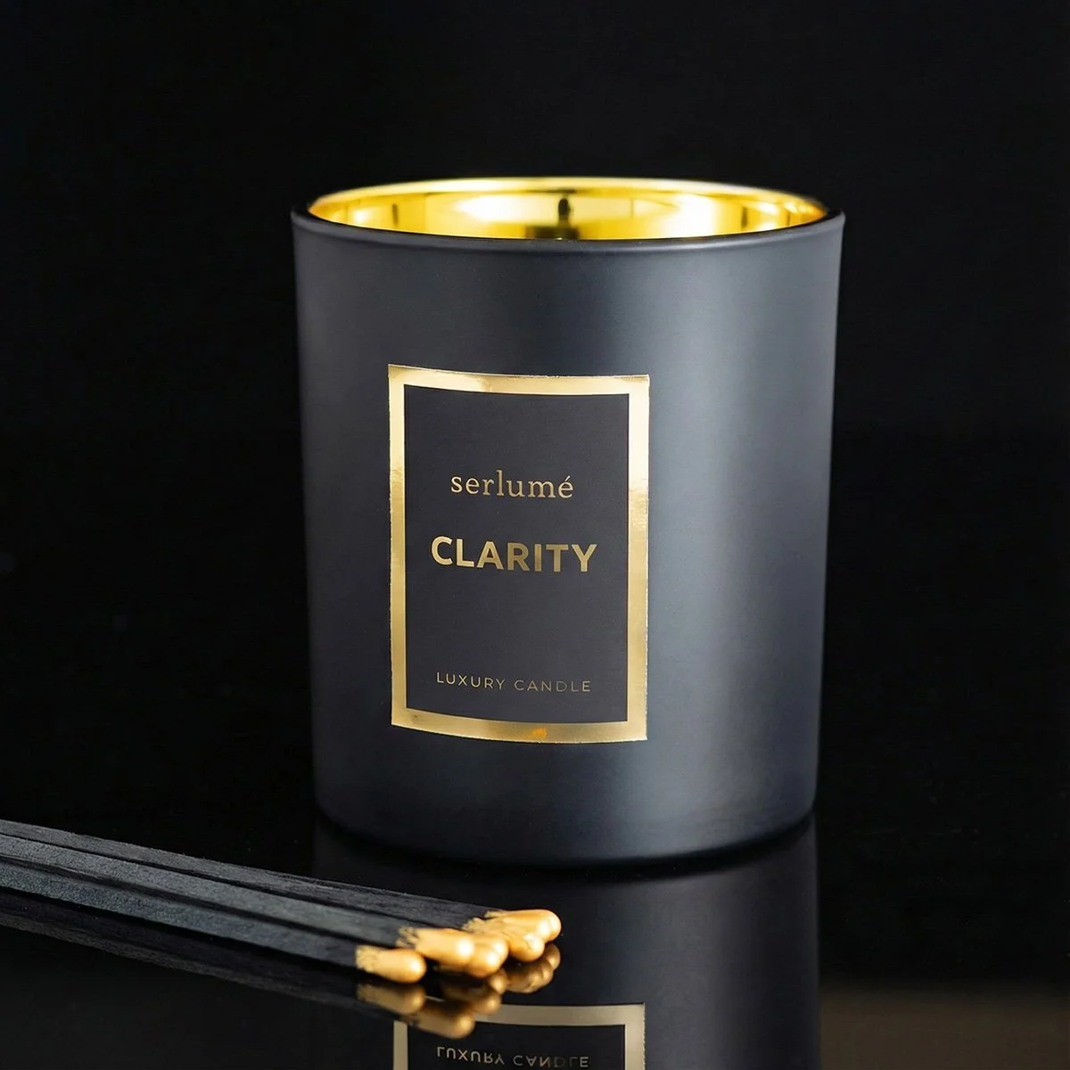 clarity-candle-gold-tipped-matches-reflection.jpg