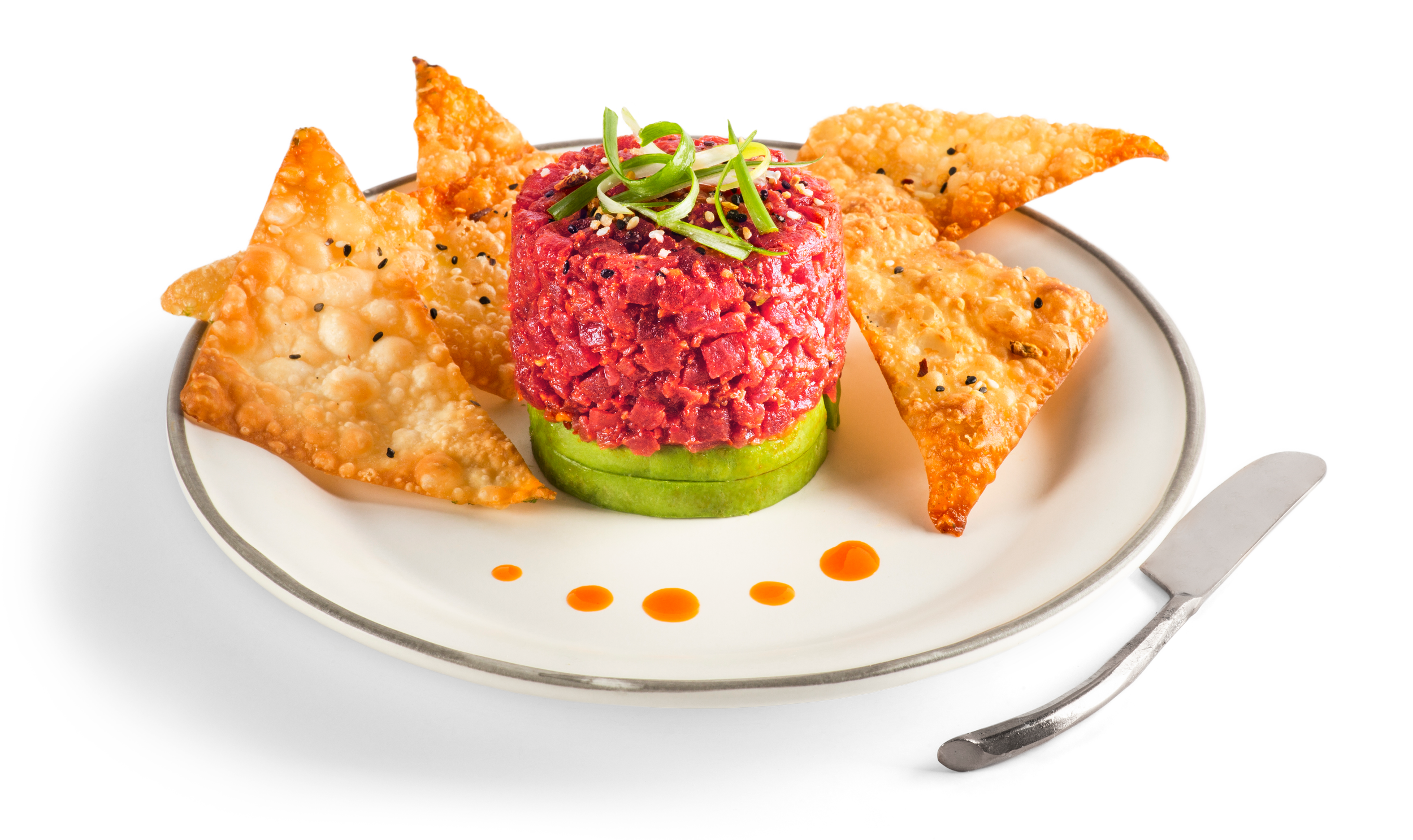 Plant Based Tuna Tartare With Avocado , Chili Crisp Oil and cruncy wonton.