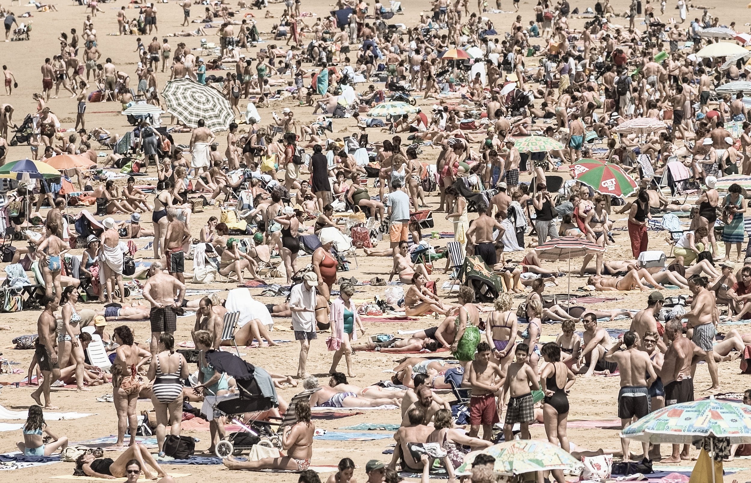 Crowded beach of San Sebastian (Spain) in 2002. 