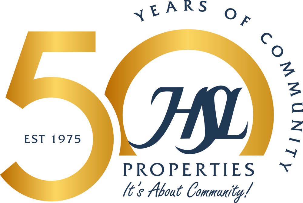Logo celebrating 50 years of properties, established in 1975, with the tagline "It's About Community!" and a stylized number 50 in gold.