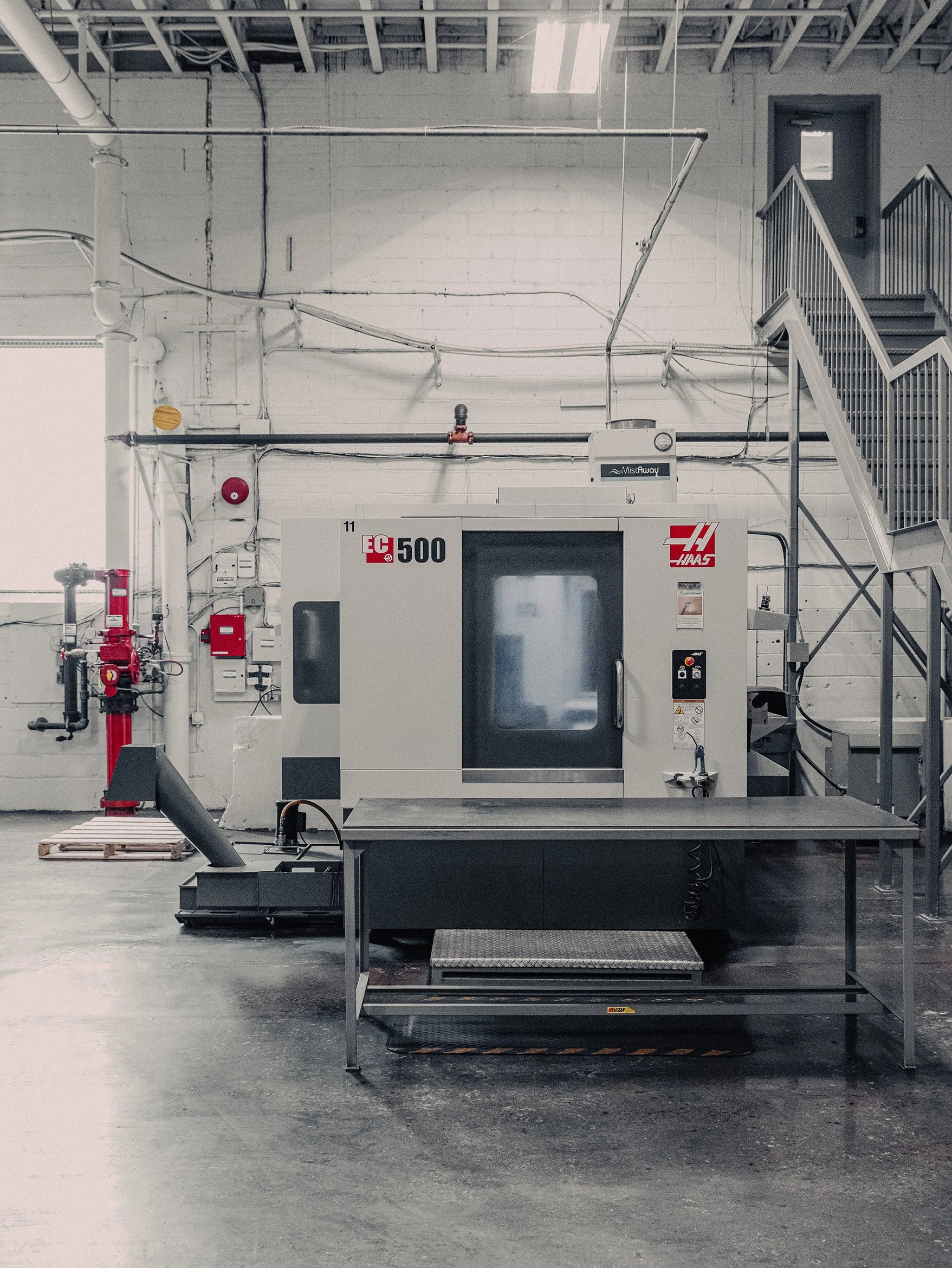 Haas EC-500 CNC machining center on Dynatool shop floor.