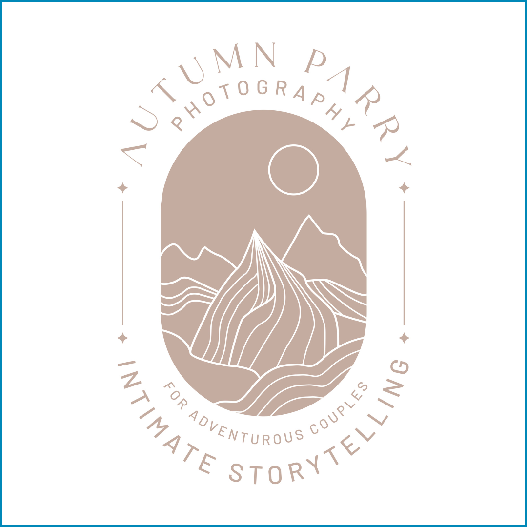Logo for Ajutumn Parkery Photography featuring a minimalist mountain landscape with a full moon in the sky, all in beige tones with thin white outline details, and text promoting storytelling for adventurous couples.