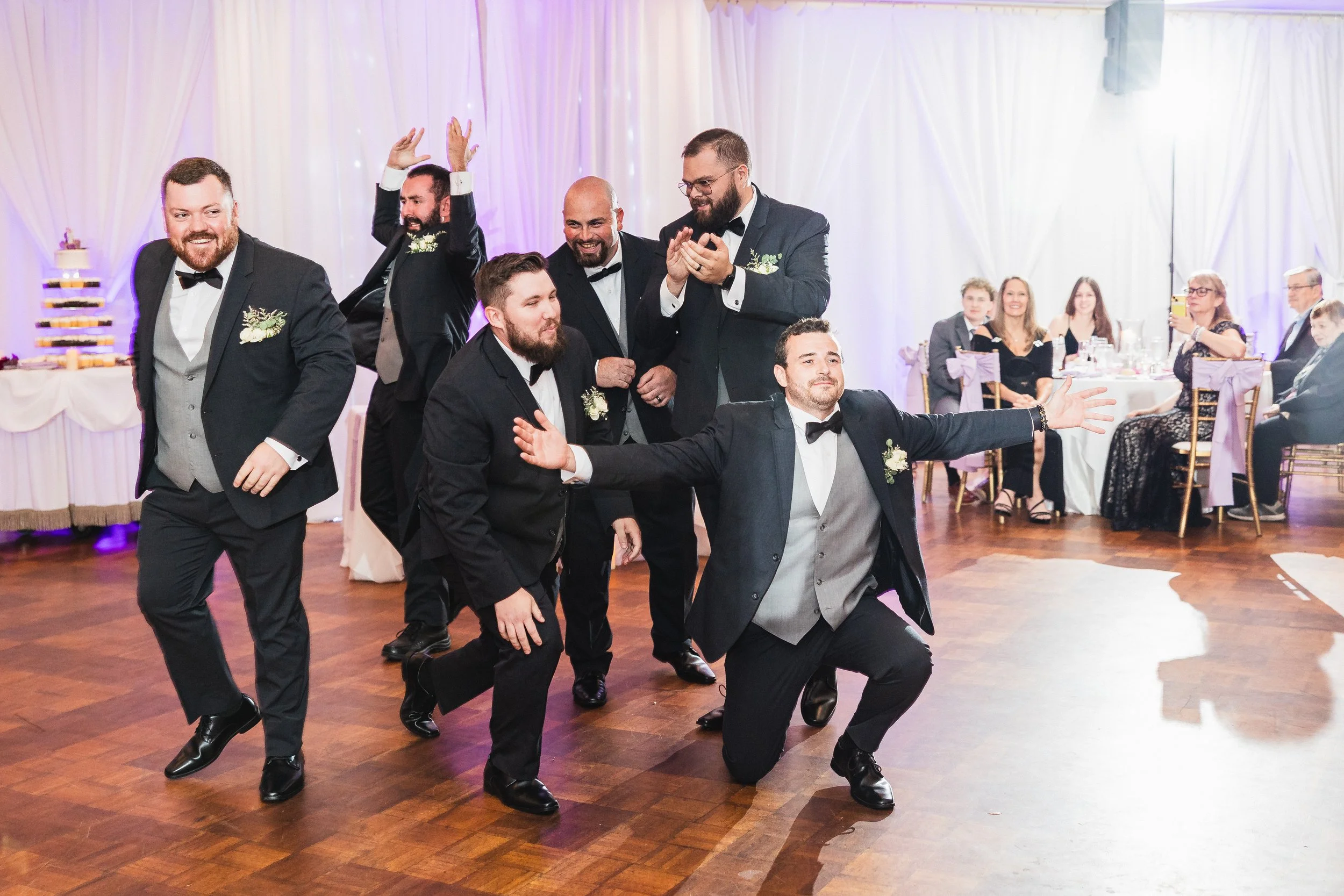 Groomsmen on dance floor