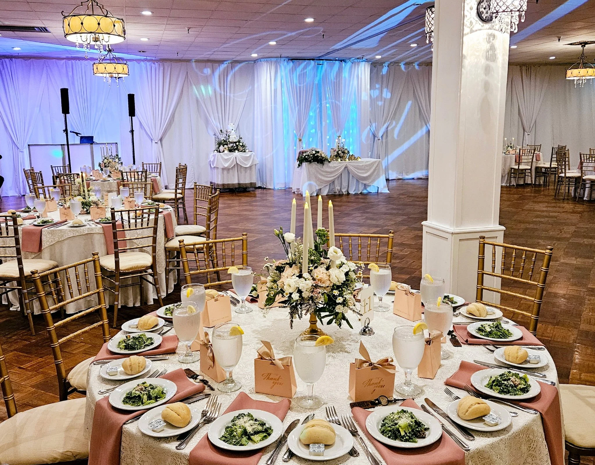 Salad plated at table in ballroom