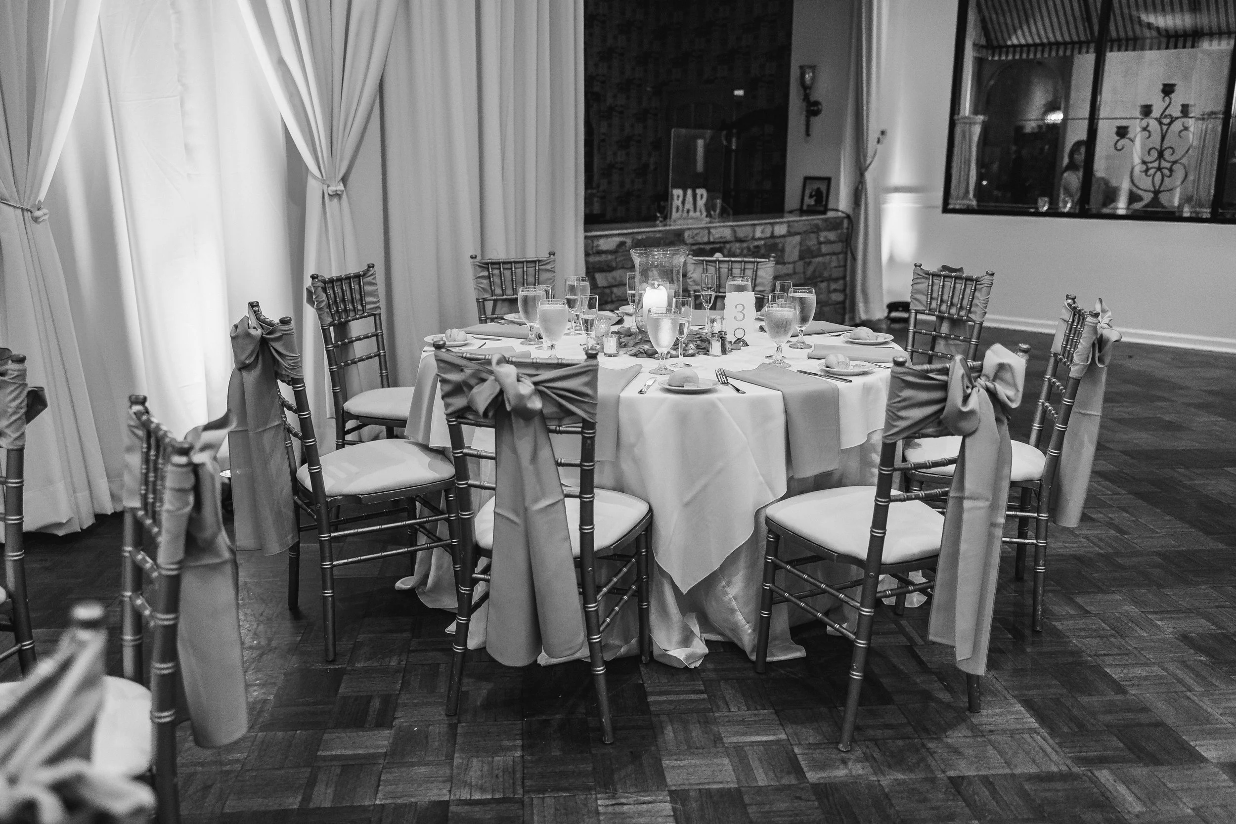 Black and white phot of guest table