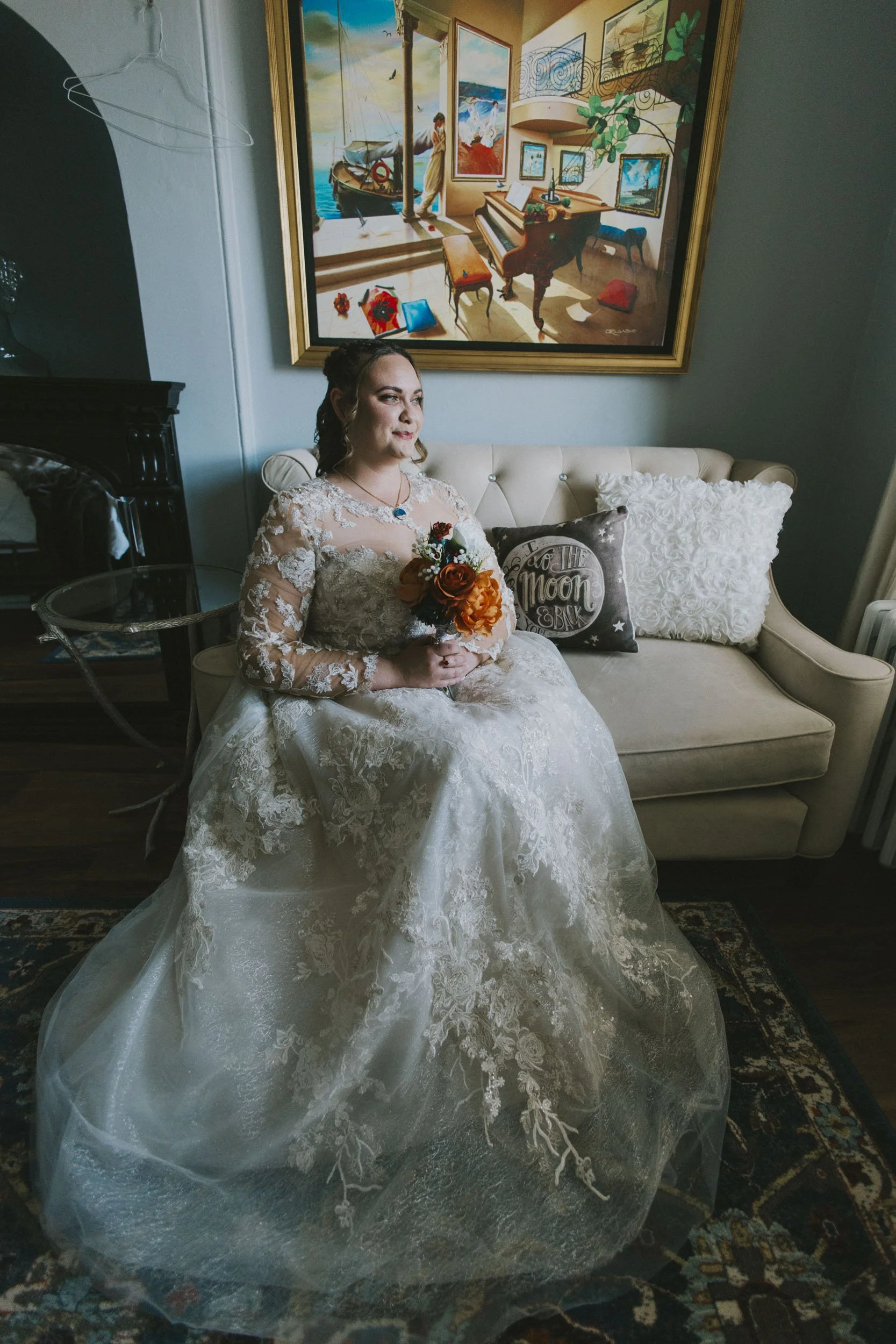 Bride gazing out window 