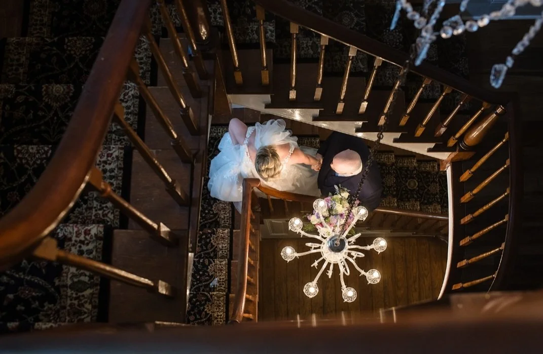 Spiral stair case with bride and groom