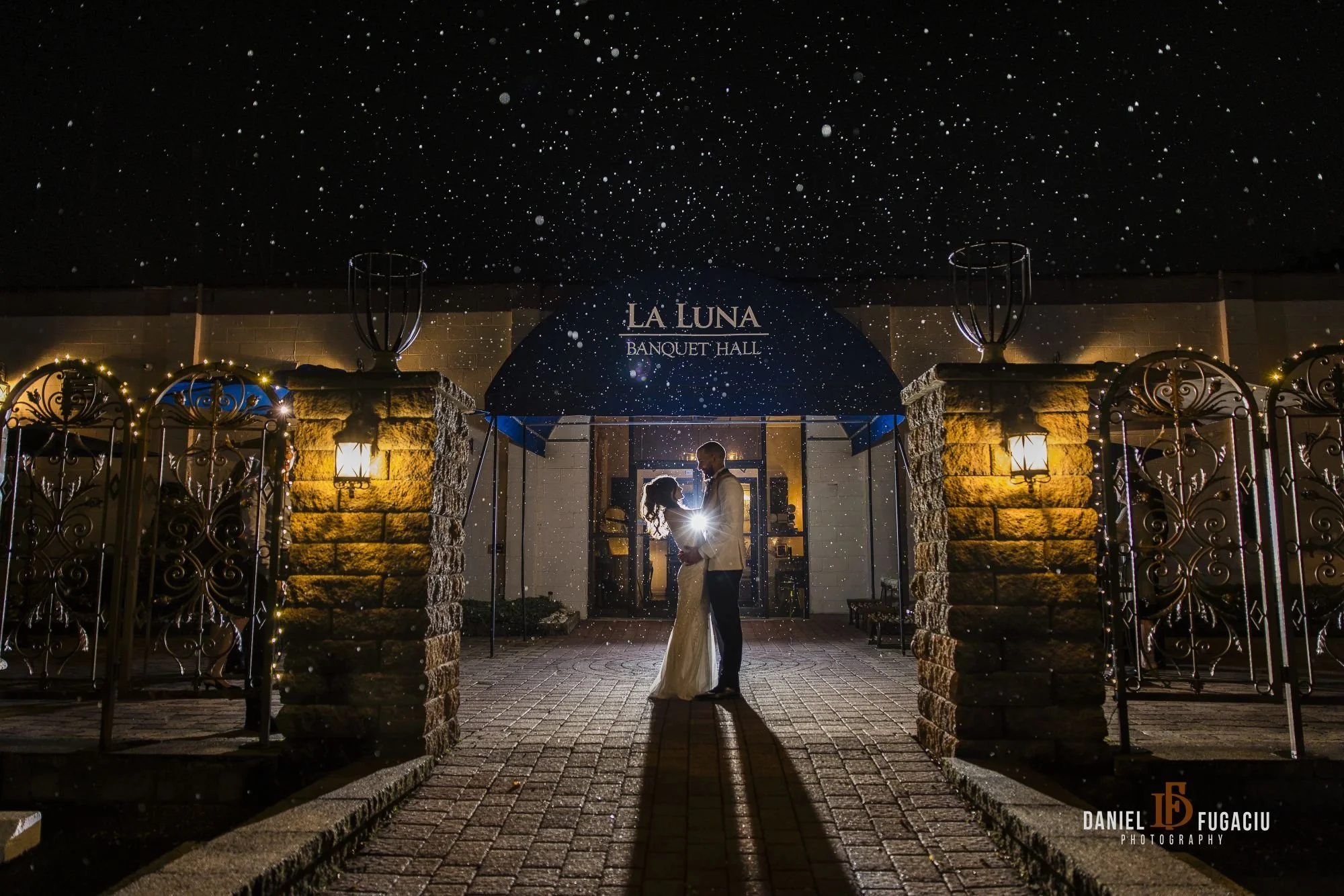 Wedding couple outside wedding hall