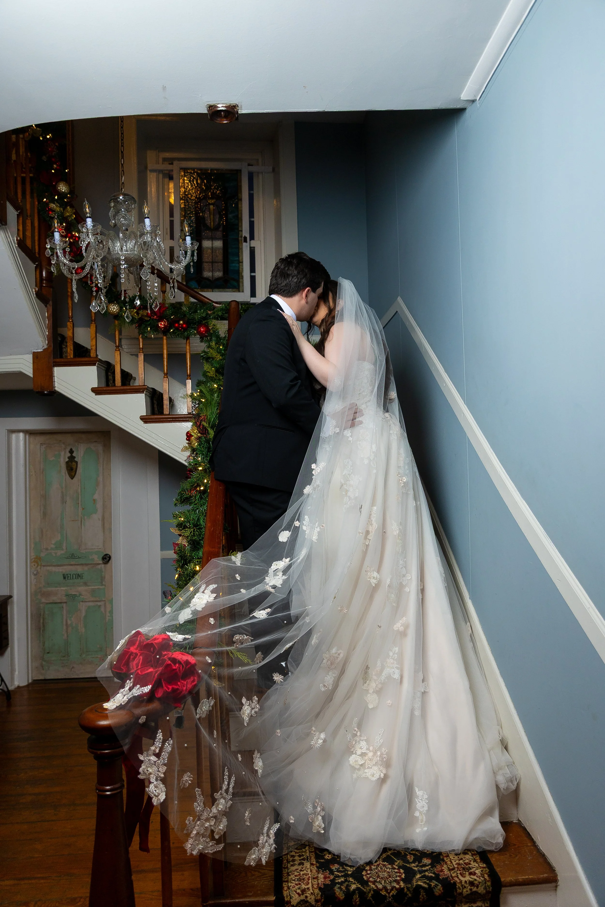 Bride and groom on stair case