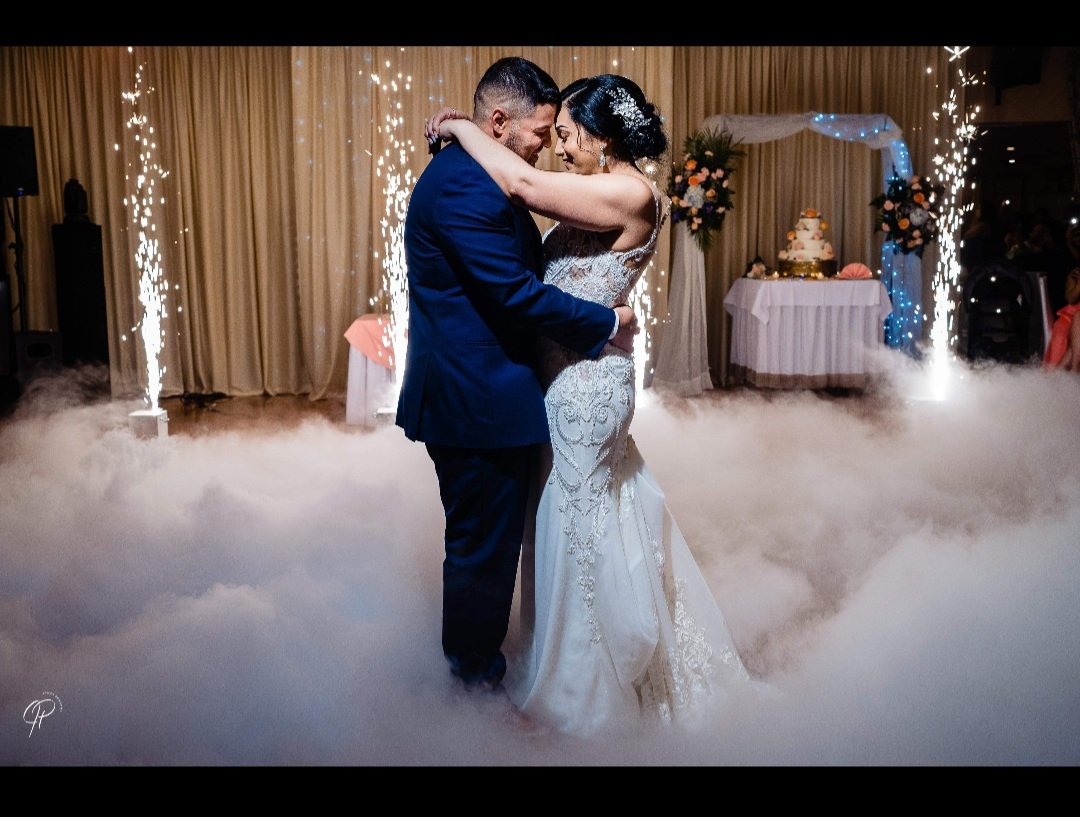 Bride and groom club dance with sparklers