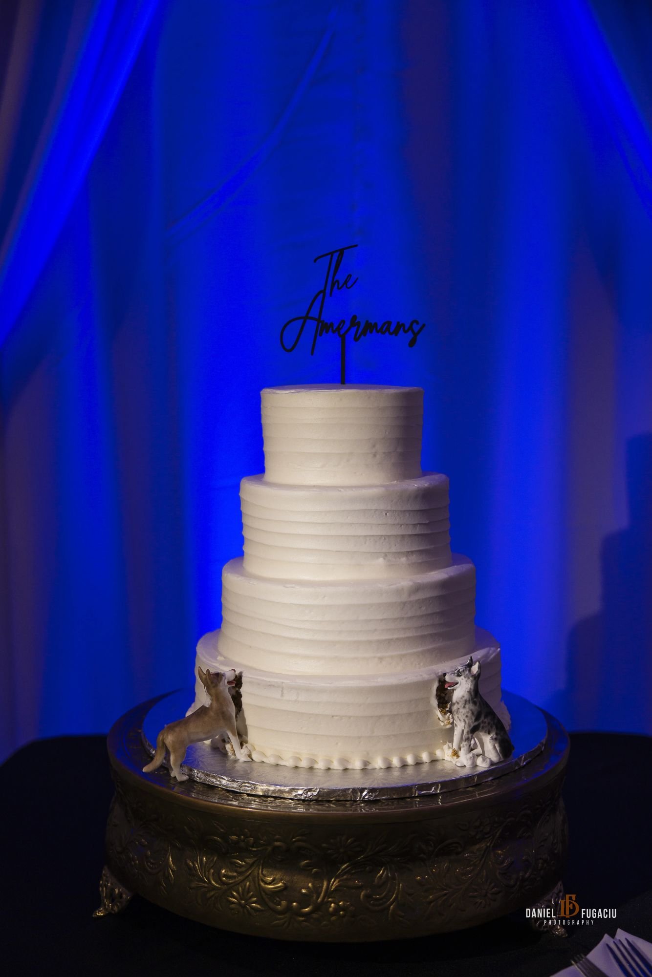 White wedding cake with blue lighting