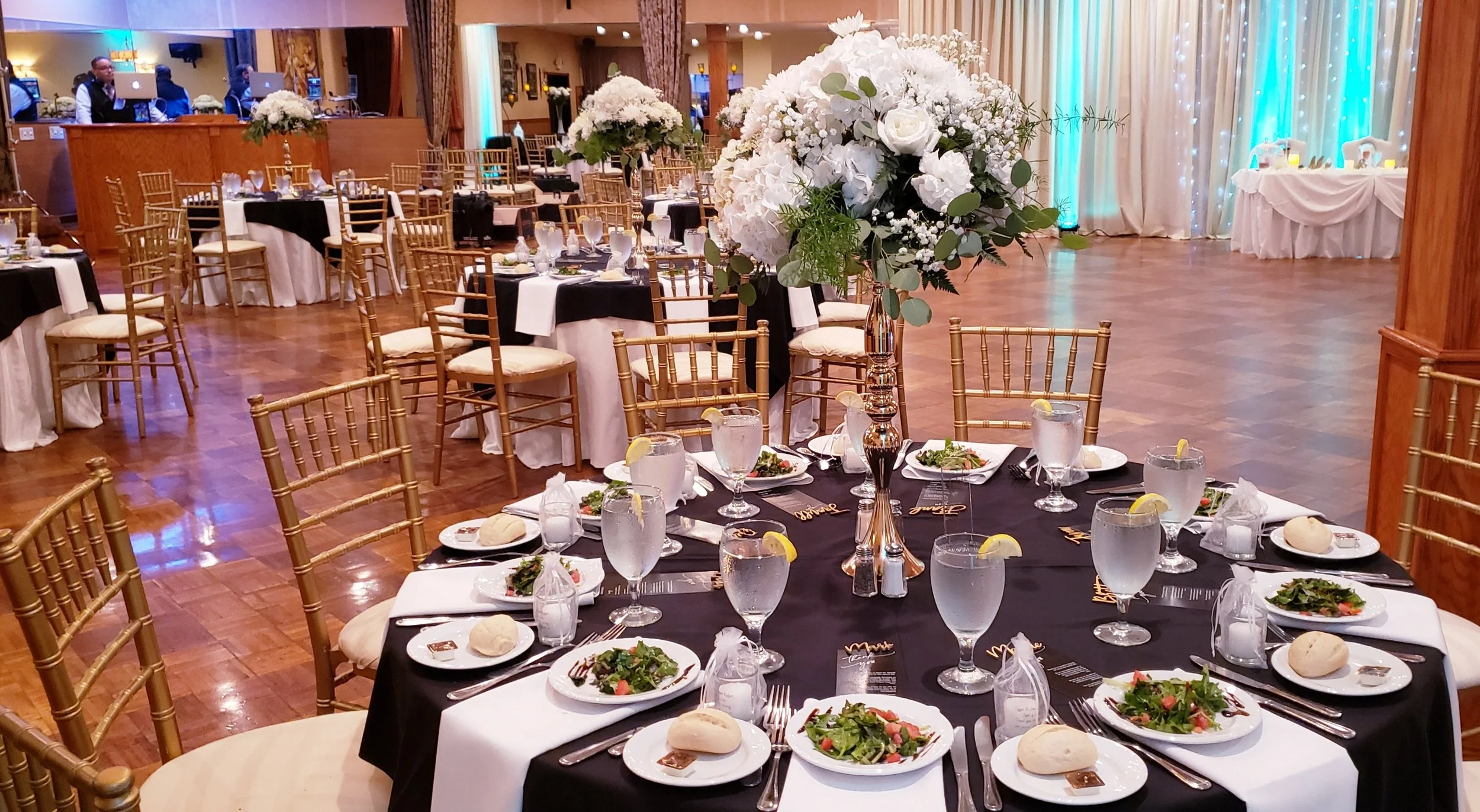 Black and white floral centerpiece guest table