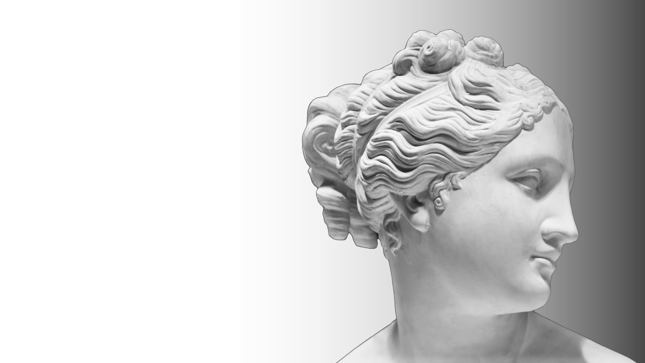 Close-up of a classical white marble sculpture of a woman's profile with detailed hair and facial features against a gradient gray background.